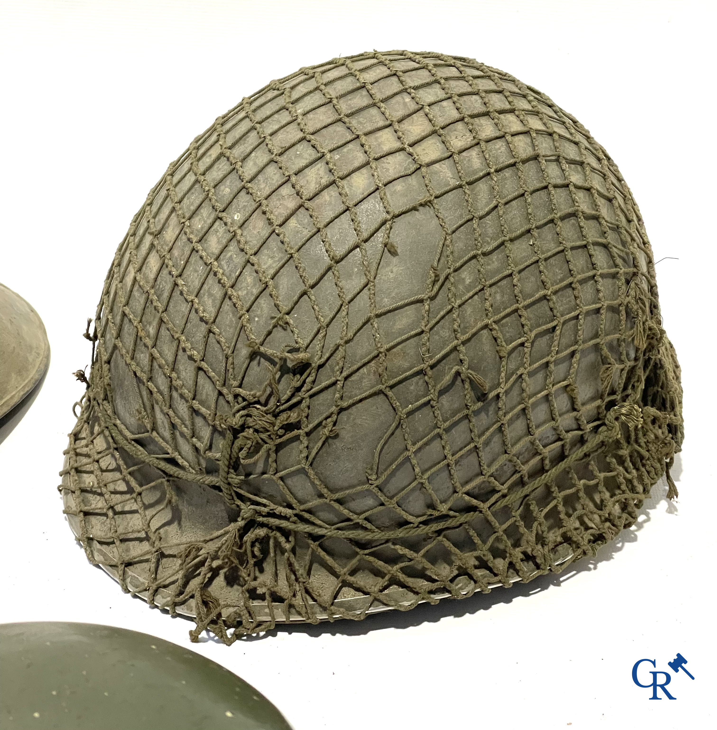 Militaria. Lot of 5 military headgear, some WWII including an officers cap from The Headline Hat Co., 1941.