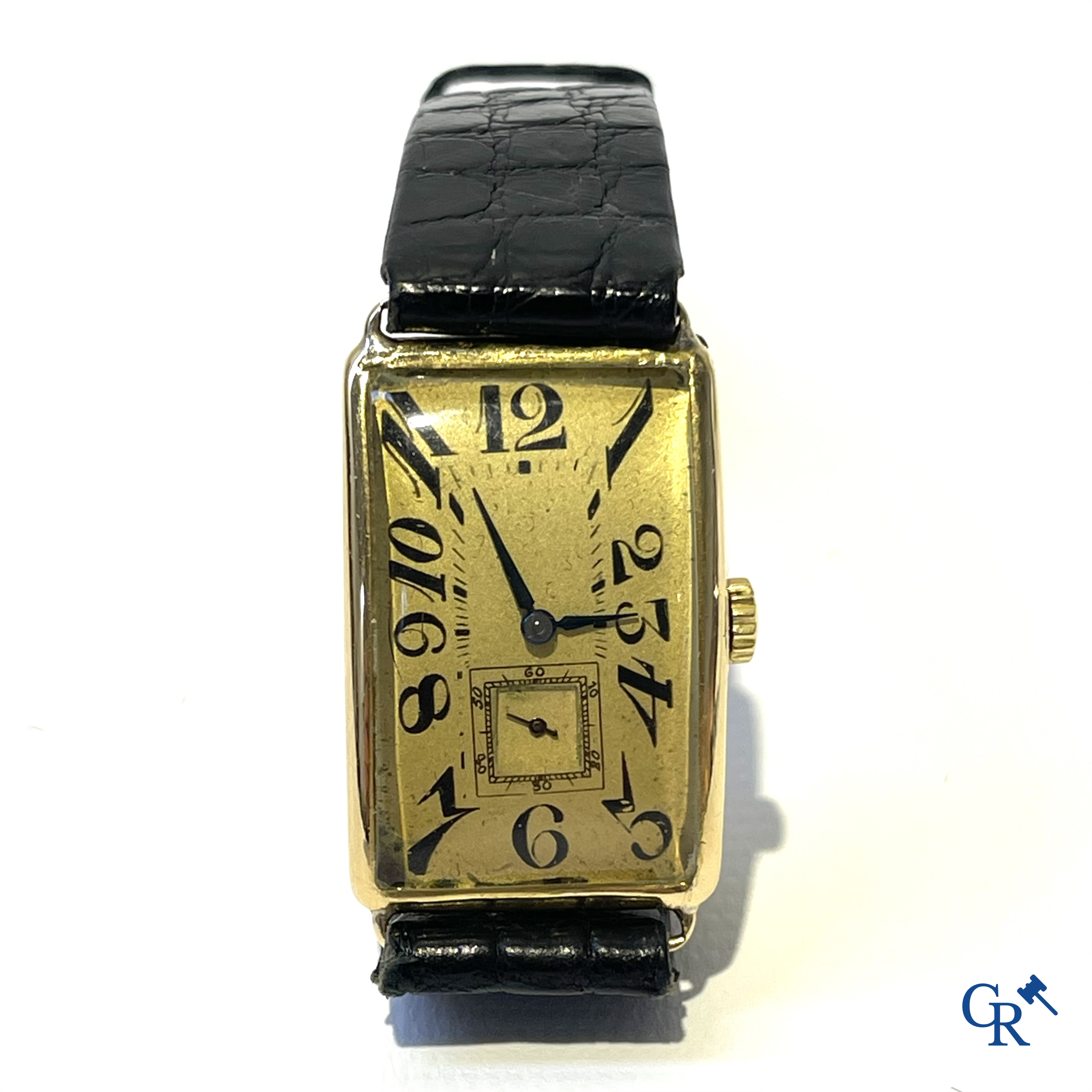 Heren polshorloge in geelgoud 750°/00. Genummerd 733459.