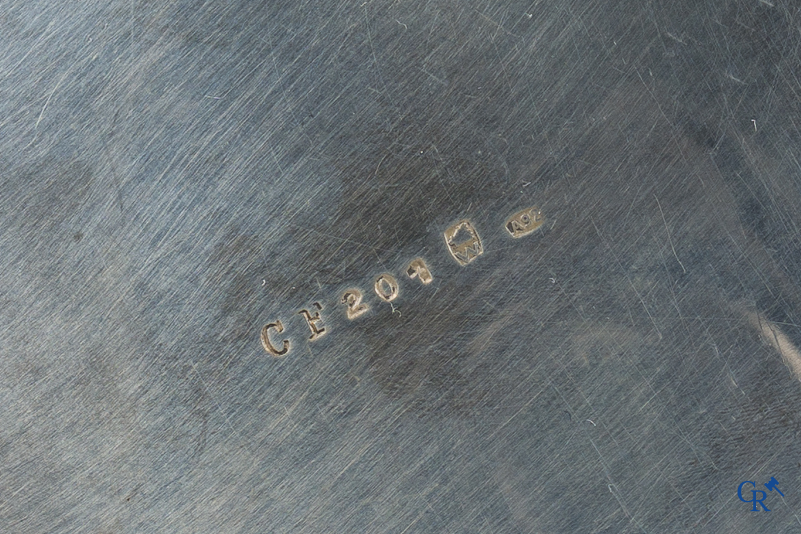 Wolfers Brussel. Mooie vide poche in zilver 925°/00. Genummerd CF201.