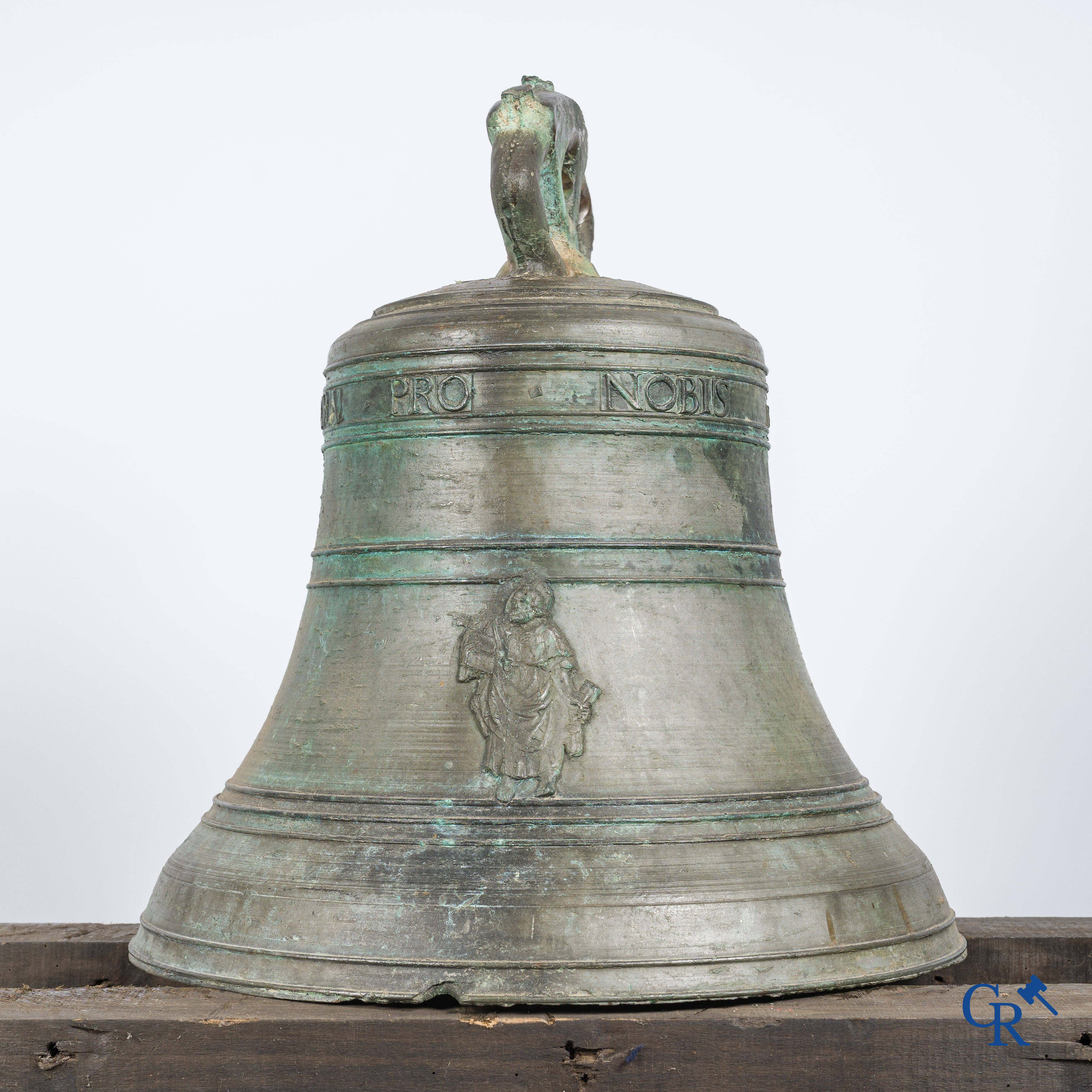 Religious objects. Large antique church crown clock or bell in bronze with inscription band. Dated 1650.