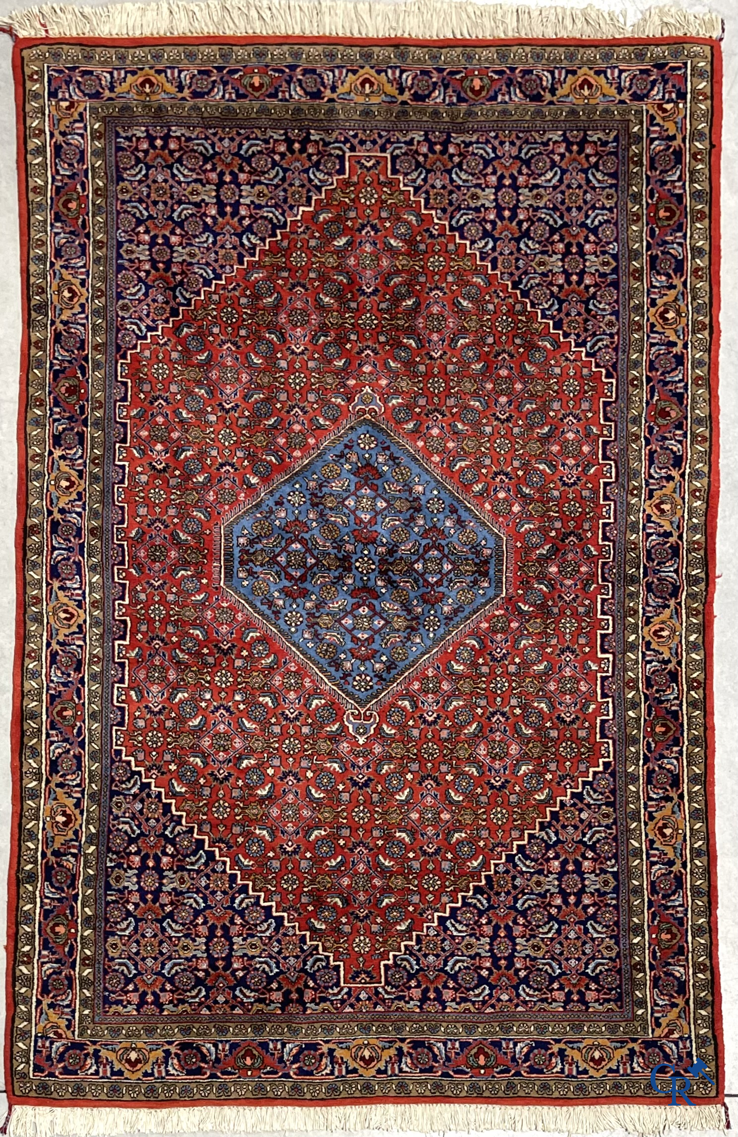 Oosterse tapijten. 2 handgeknoopte tapijten in wol.