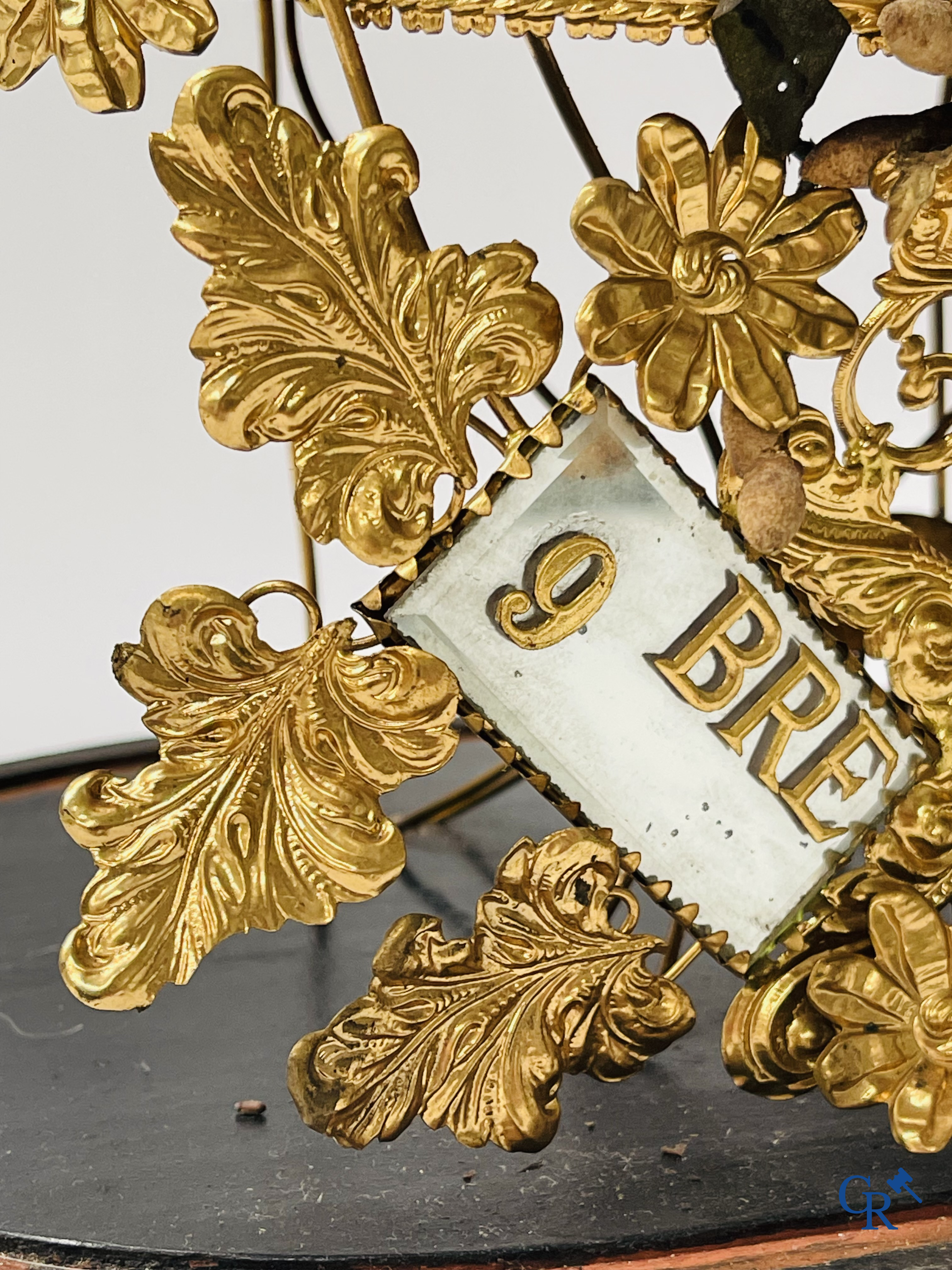 2 domes with wedding bouquet, one with flowers in biscuit, another with mirrors, dated 1908.