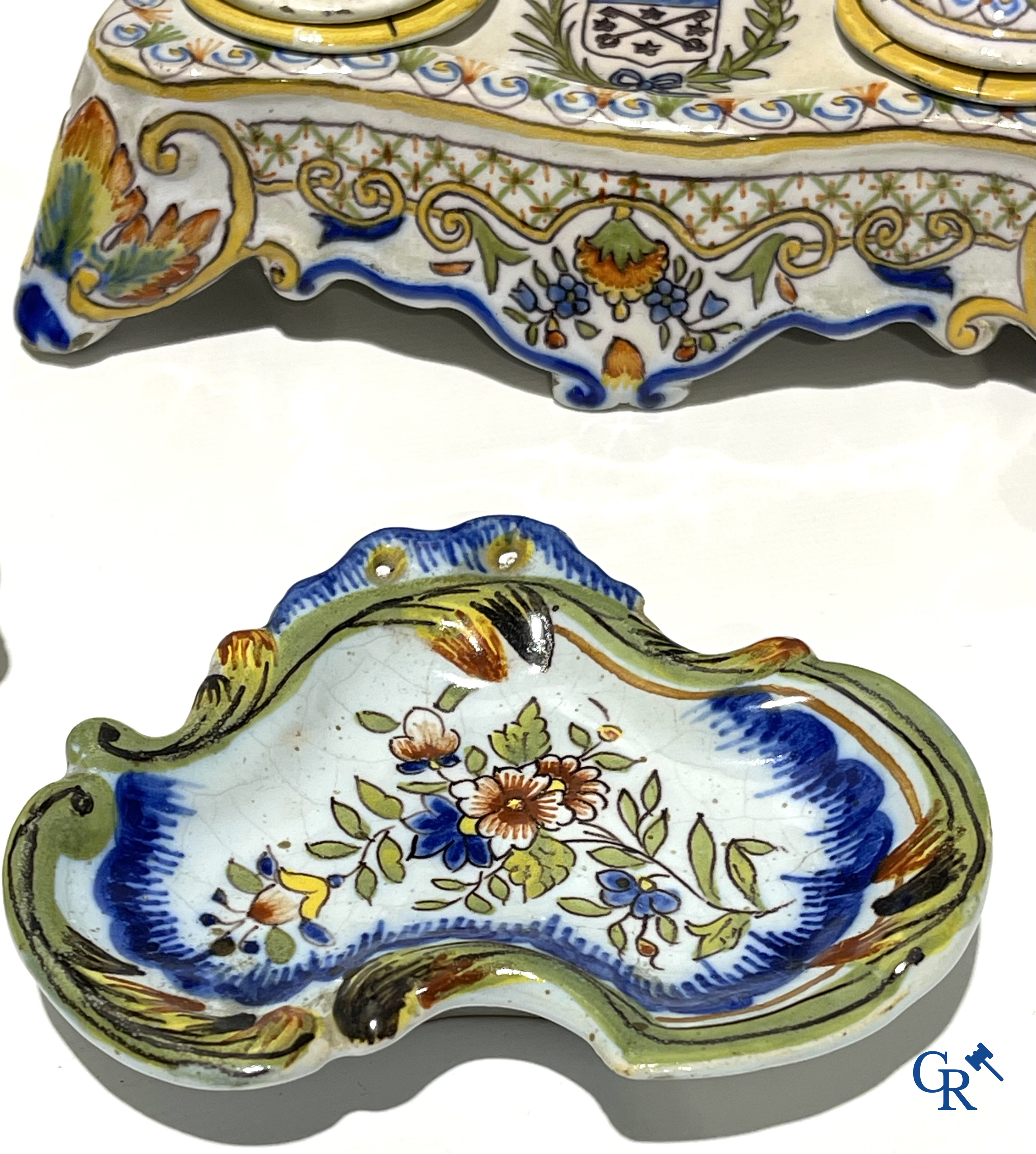 Faience of Rouen, Devres. Interesting and large lot with various polychrome pieces. 19th century.