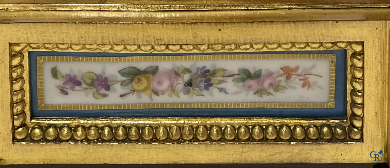 A 3-piece chimney clockset with Sèvres porcelain. LXVI style, circa 1920.