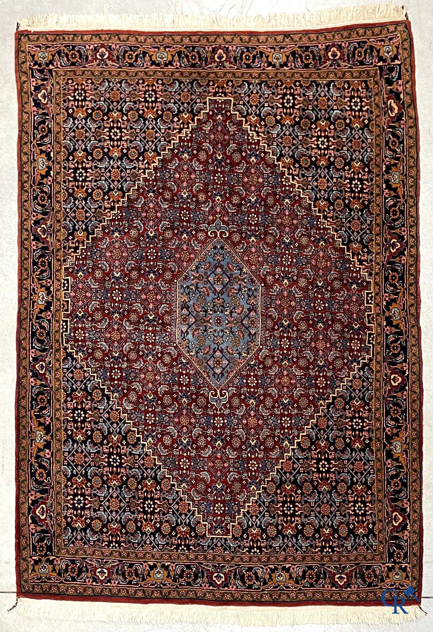 Oosterse tapijten. 2 handgeknoopte tapijten in wol.