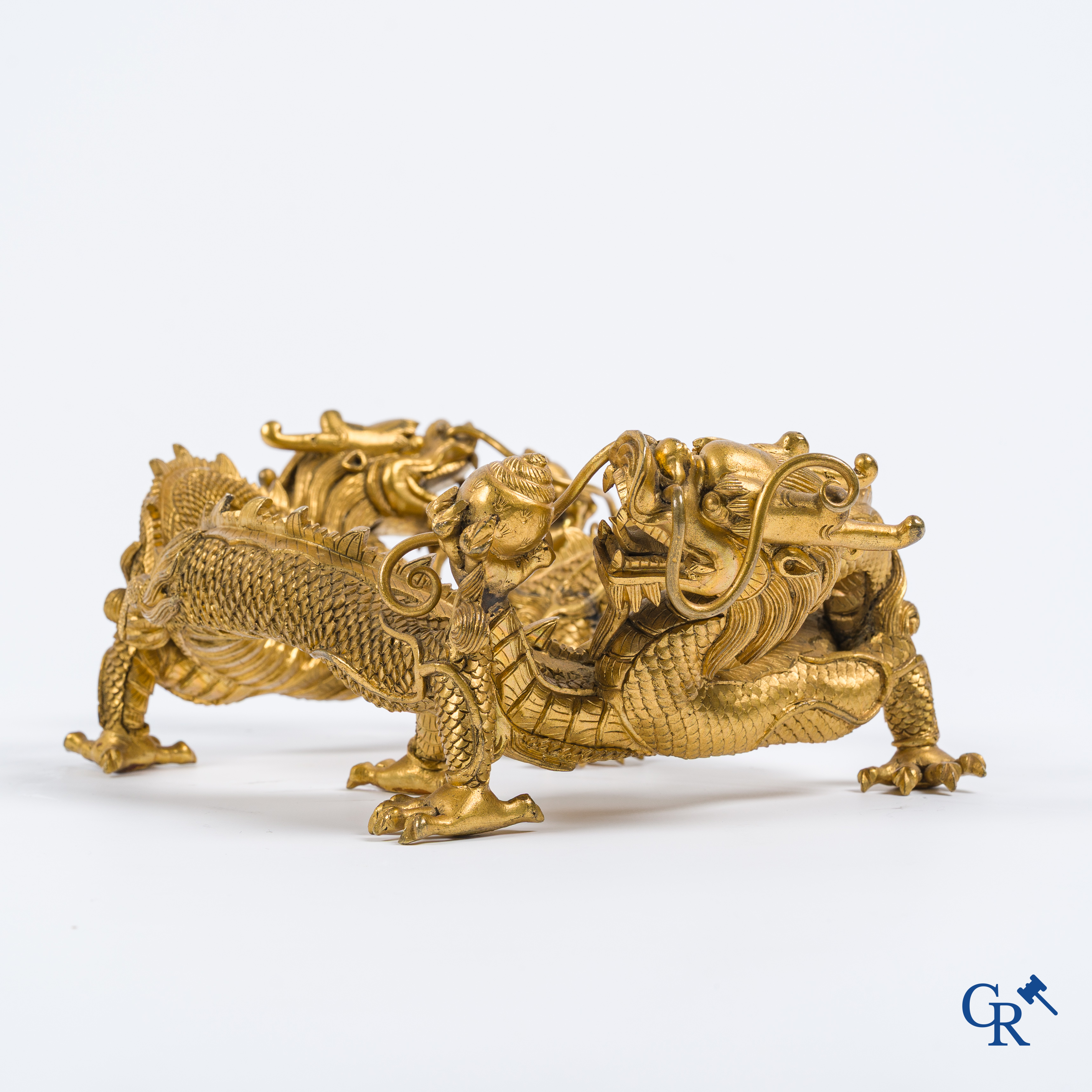 Asian Art. China. A rare Chinese gilt-bronze dragon stand. Qing Dynasty.