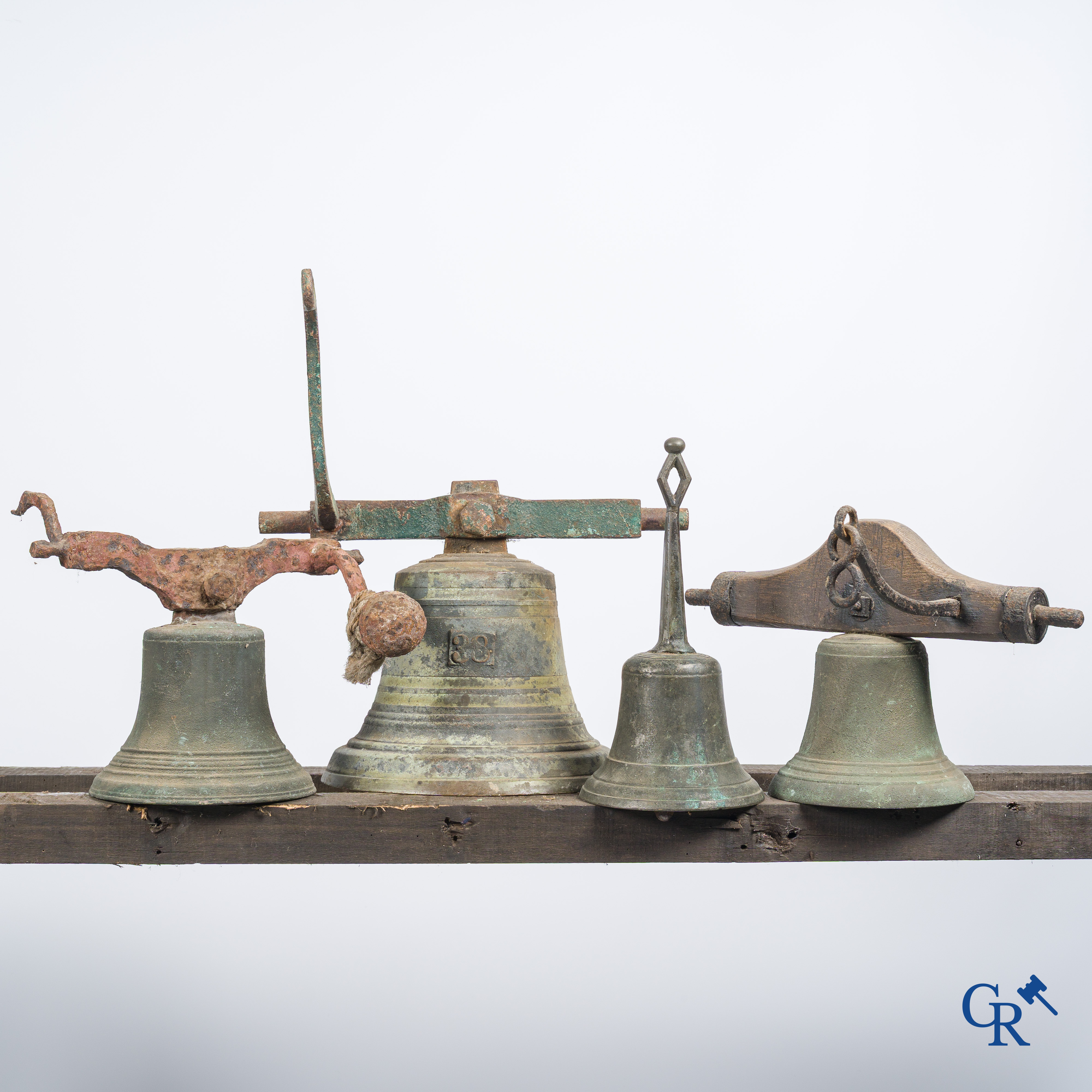 4 antique various bells in bronze.