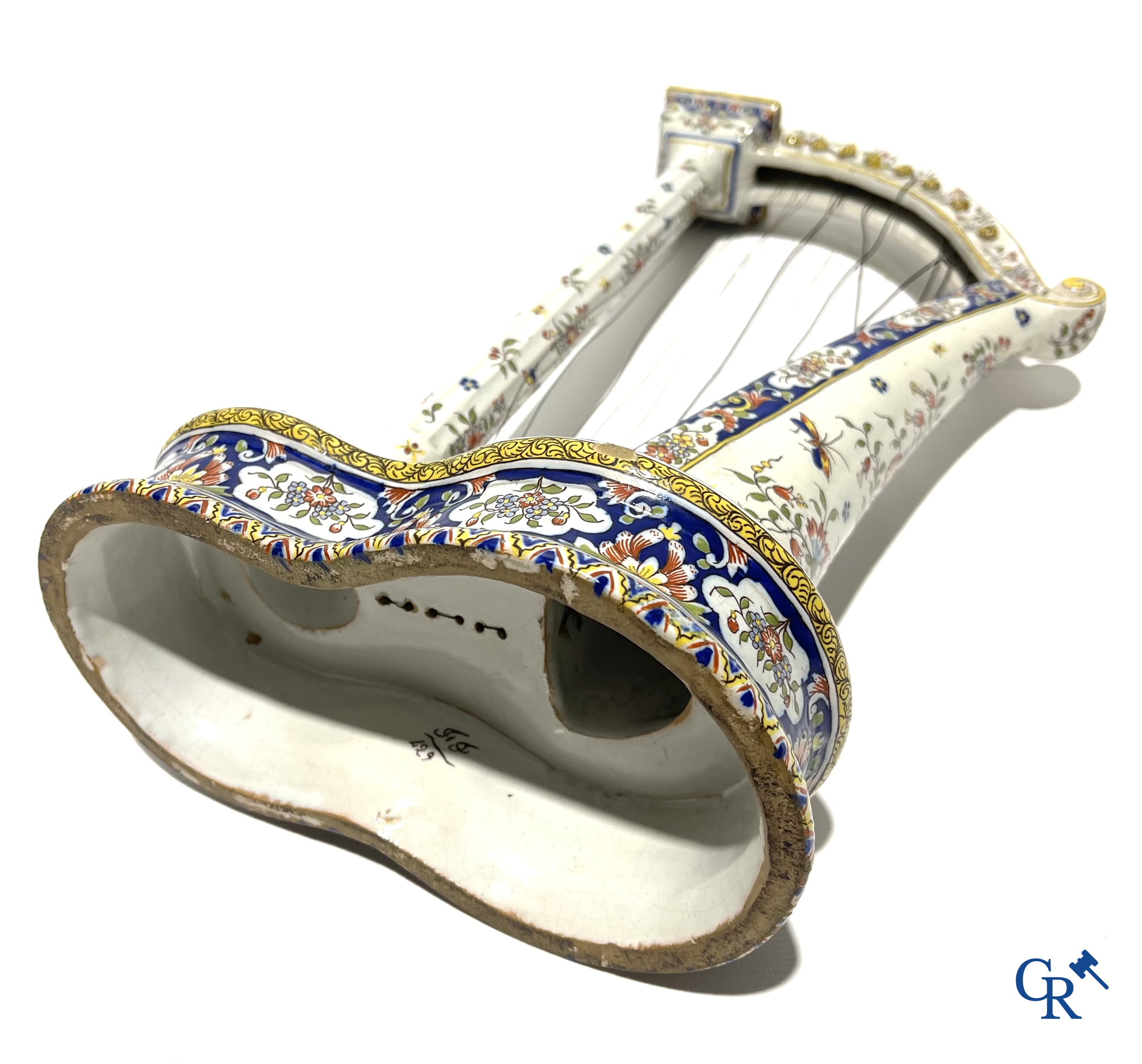 Faience of Rouen, Devres. Interesting and large lot with various polychrome pieces. 19th century.