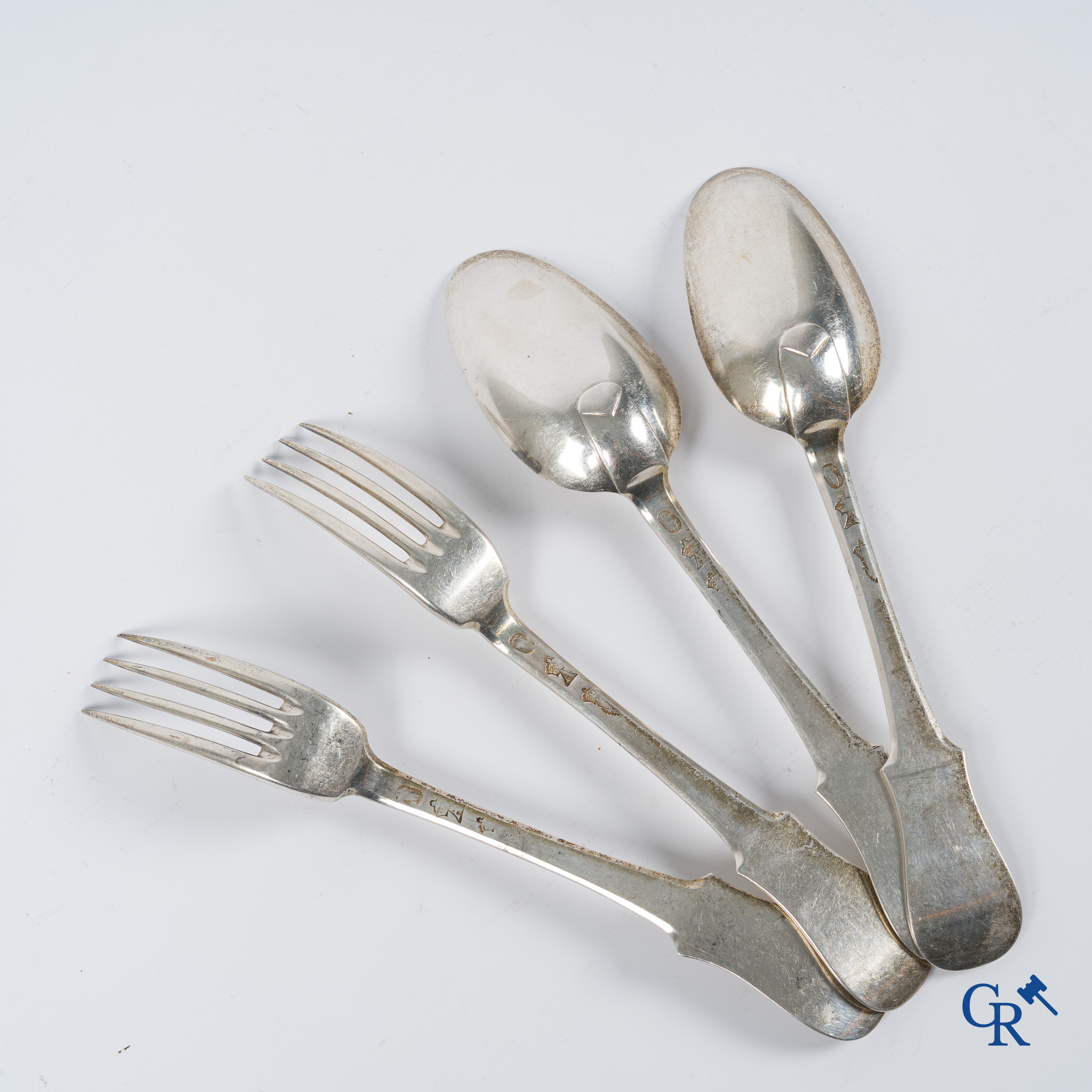 Silver. Very interesting and big lot with silver cutlery. 18th century. Different hallmarks. 20 forks and 15 spoons.