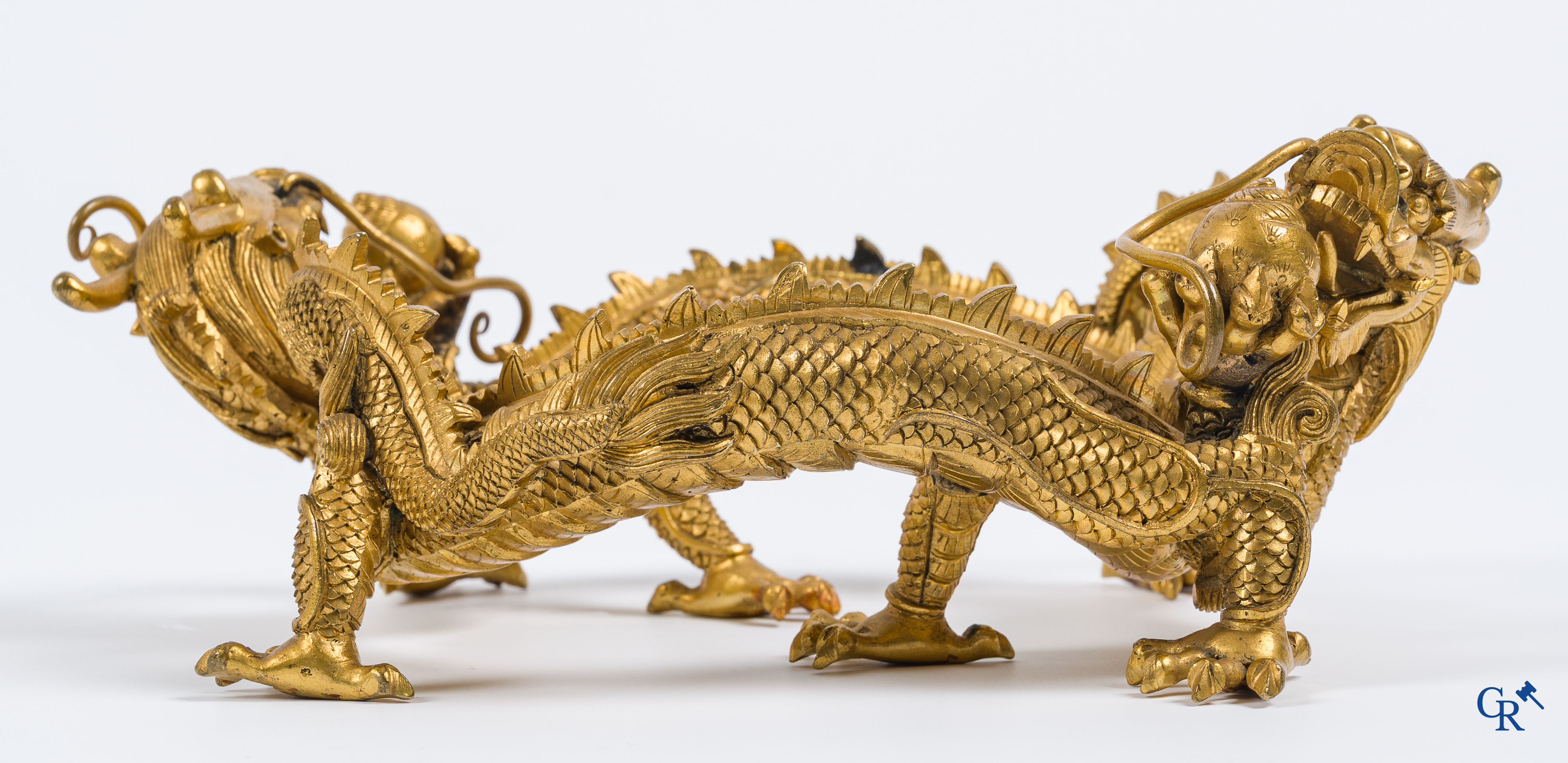 Asian Art. China. A rare Chinese gilt-bronze dragon stand. Qing Dynasty.