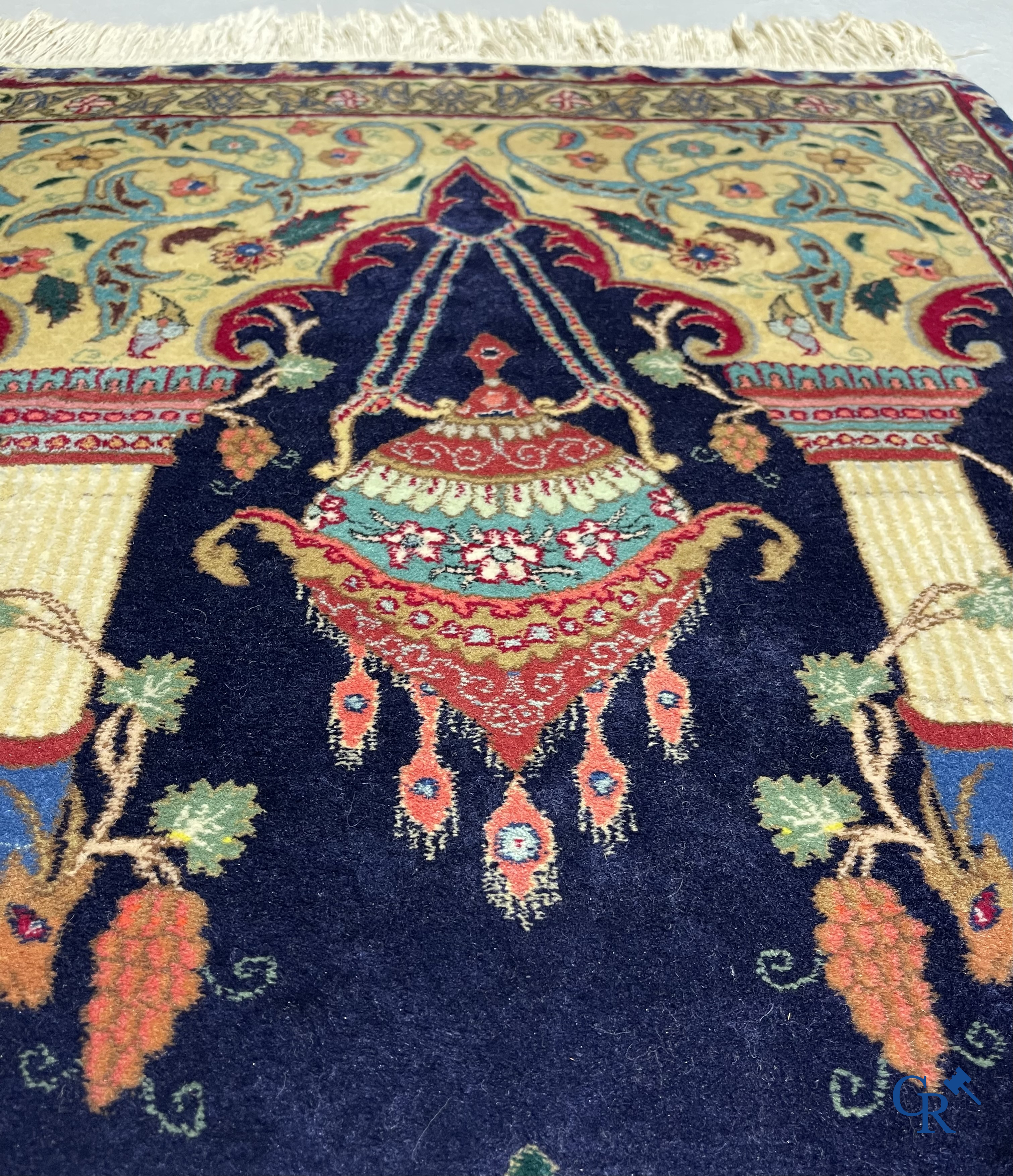 Oriental carpets. A wool prayer carpet.