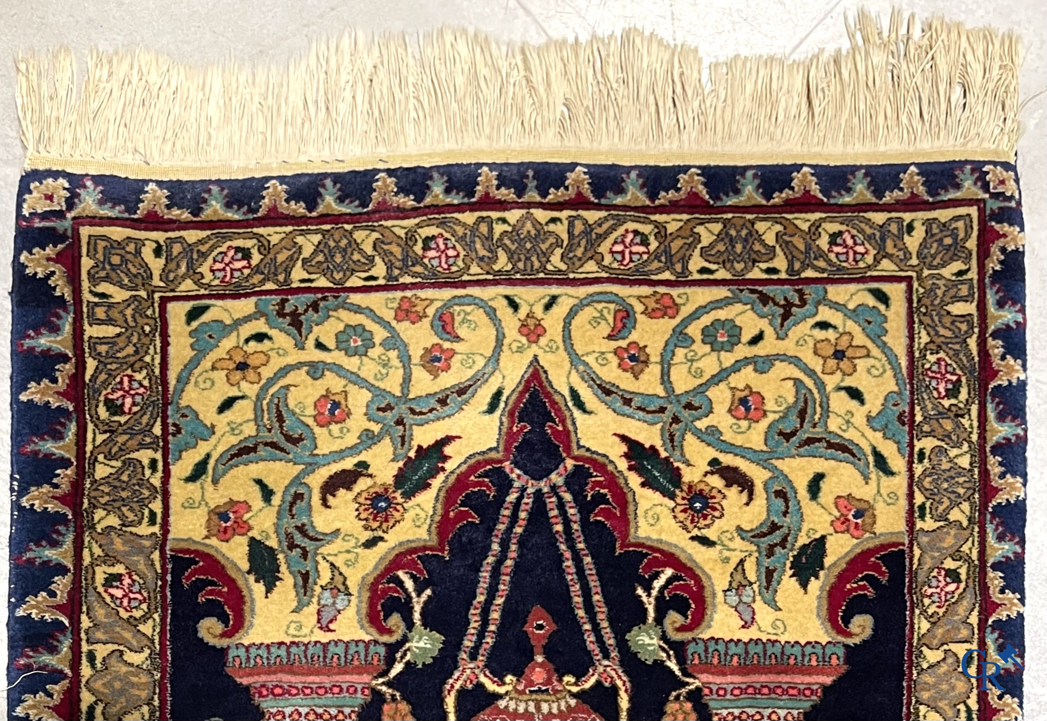 Oriental carpets. A wool prayer carpet.