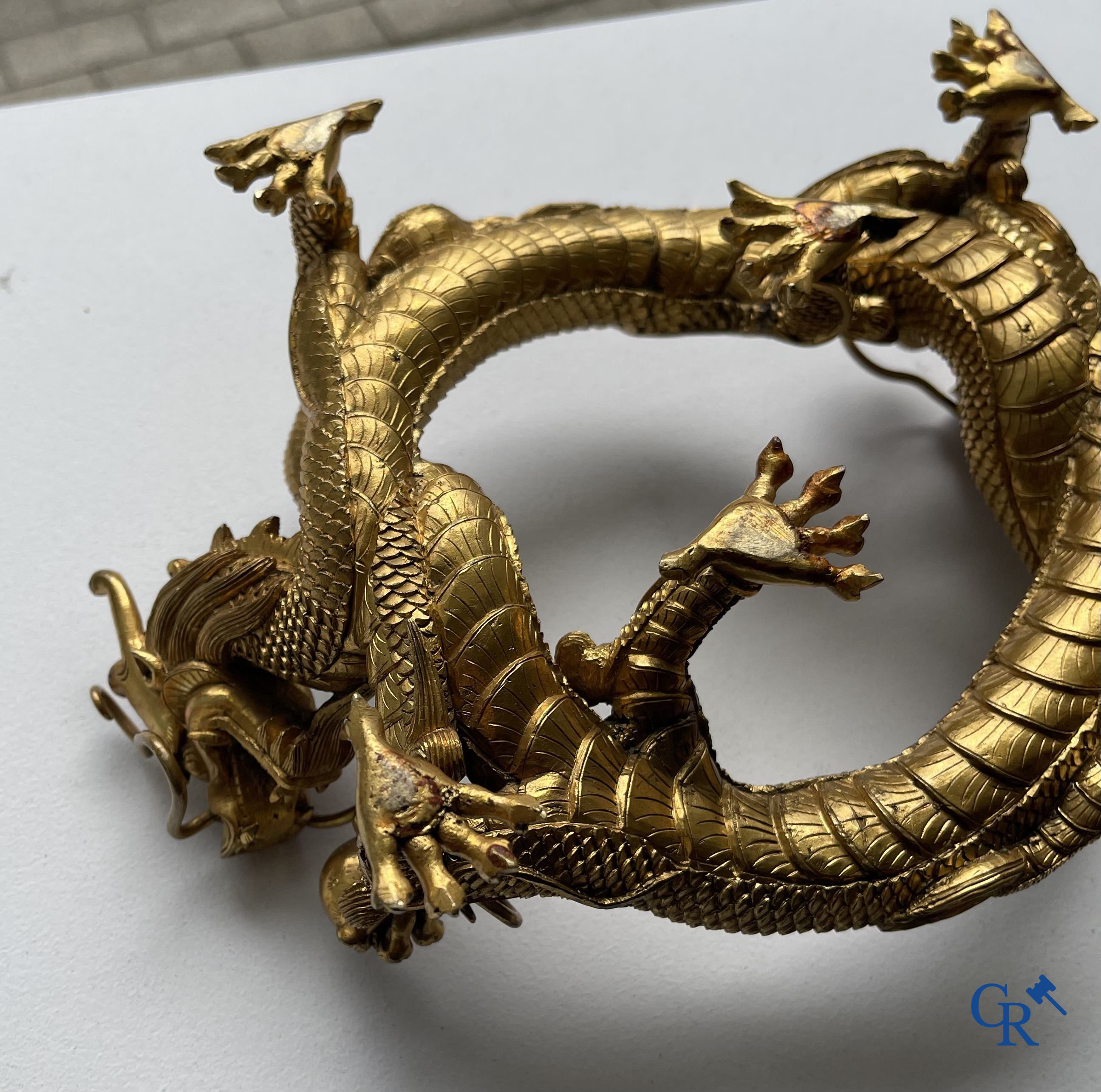Asian Art. China. A rare Chinese gilt-bronze dragon stand. Qing Dynasty.