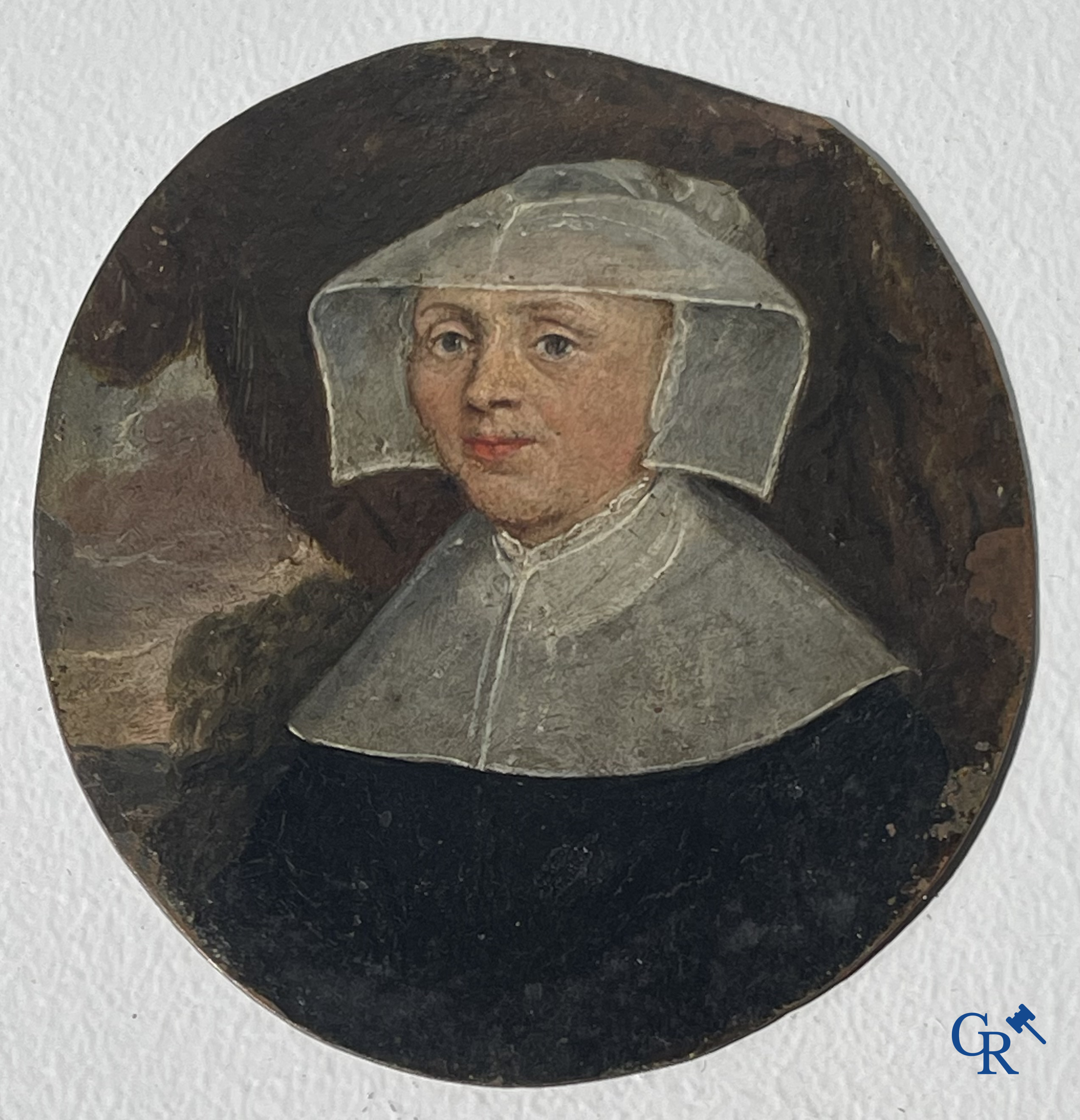 Miniature portrait of a lady in traditional dress with white hood. Oil on copper. 18th-19th century.