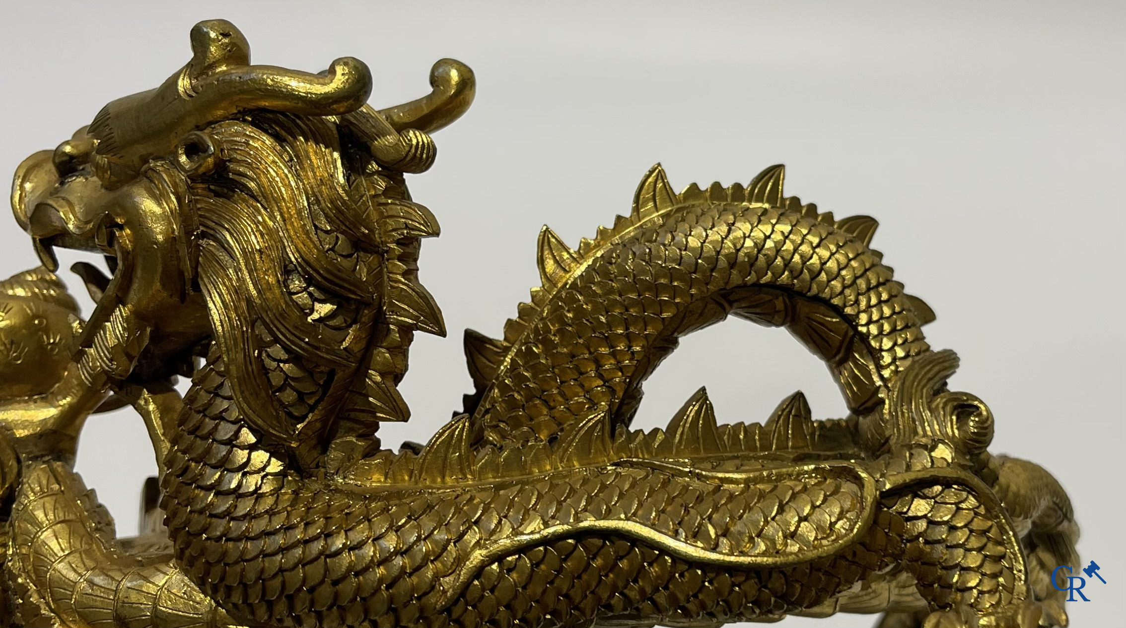 Asian Art. China. A rare Chinese gilt-bronze dragon stand. Qing Dynasty.