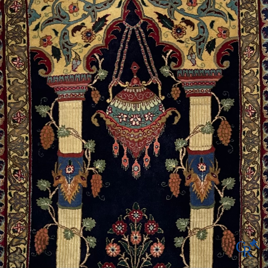 Oriental carpets. A wool prayer carpet.