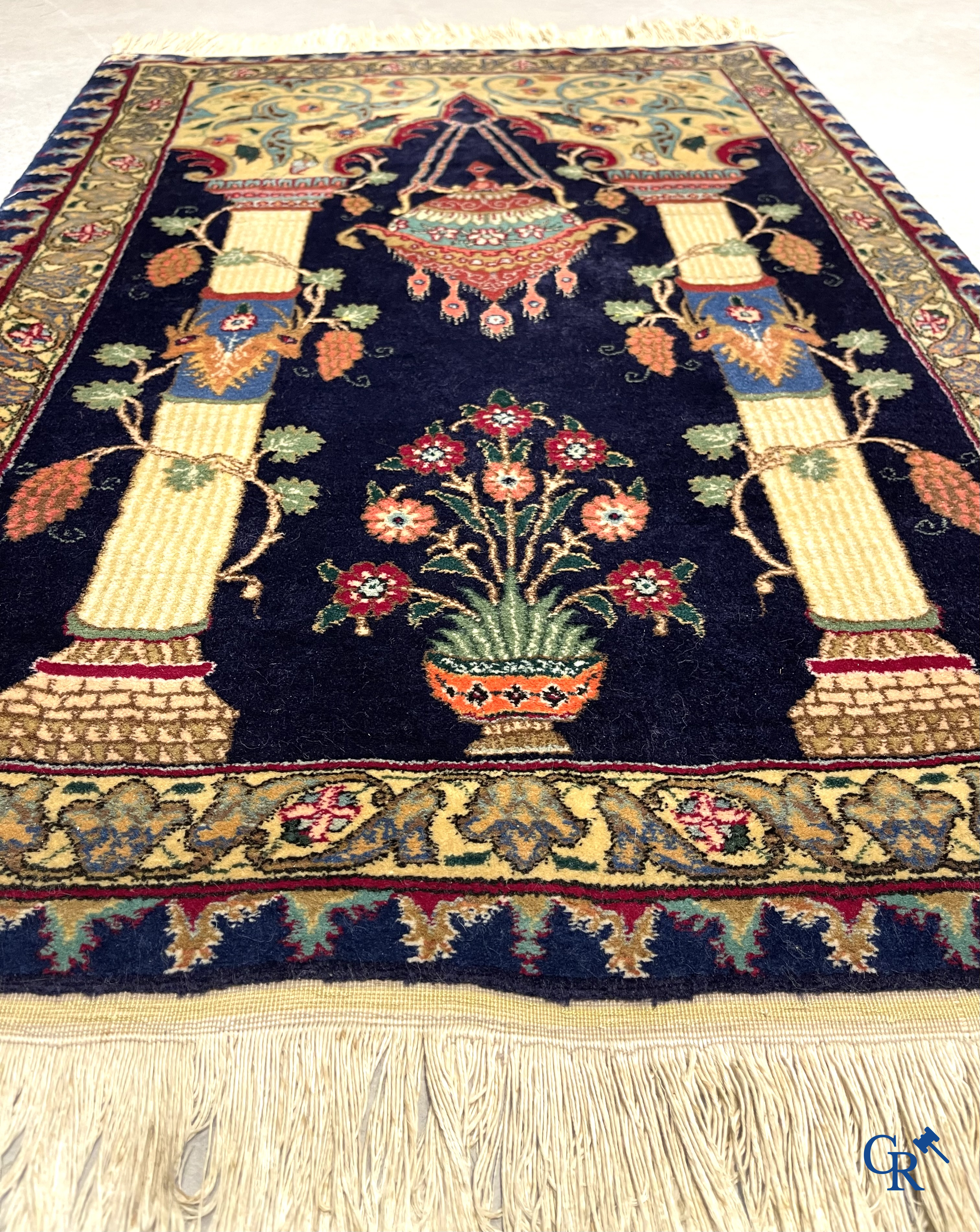 Oriental carpets. A wool prayer carpet.