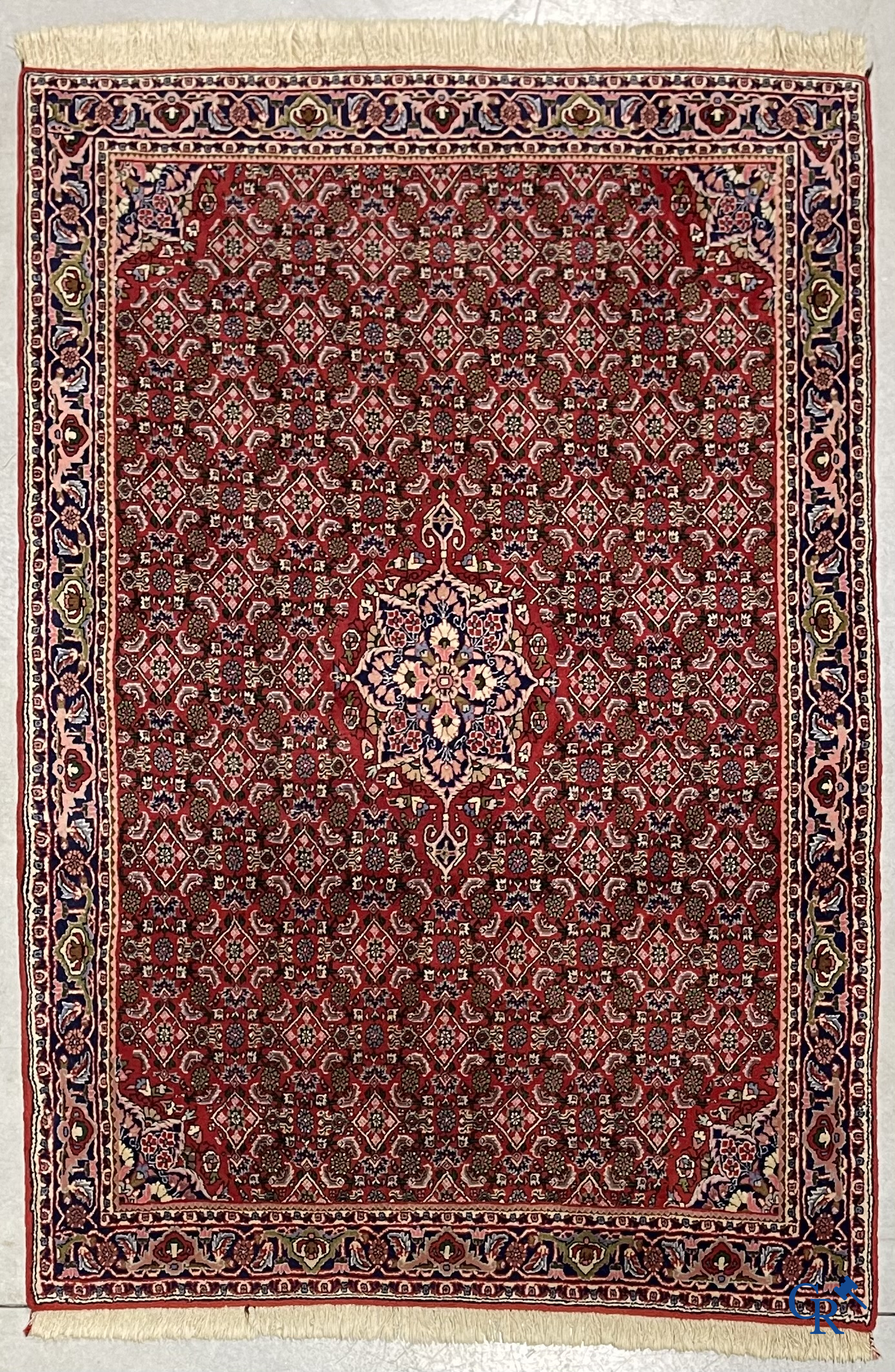 Oosterse tapijten. 2 handgeknoopte tapijten in wol.