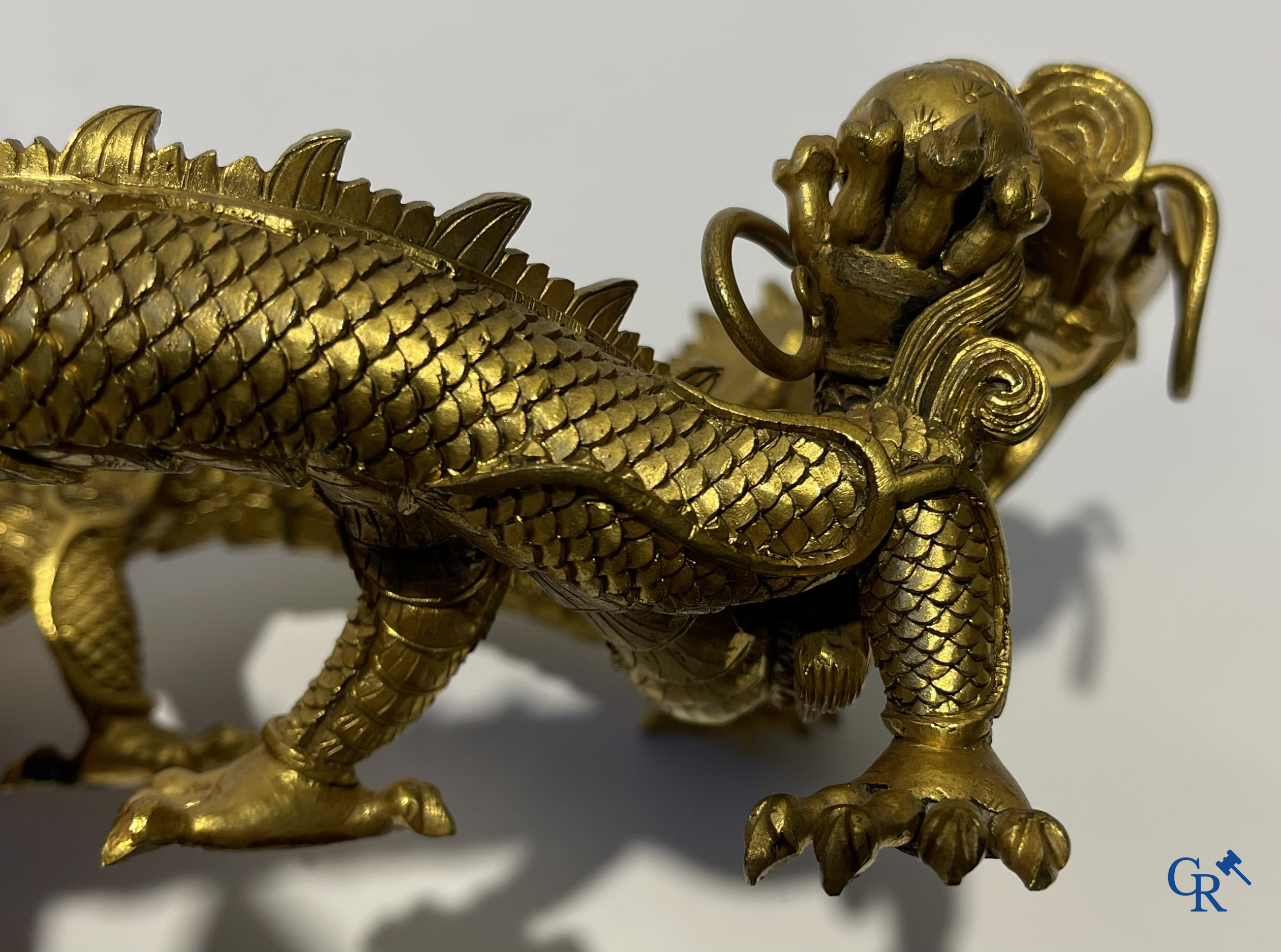 Asian Art. China. A rare Chinese gilt-bronze dragon stand. Qing Dynasty.