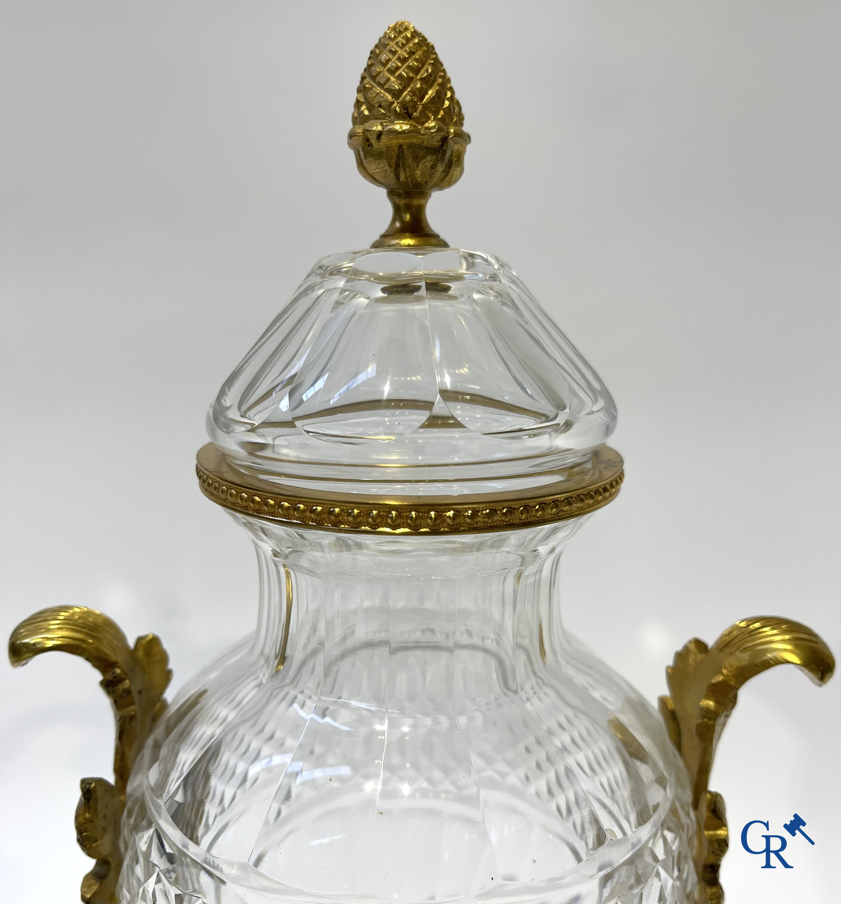 A lot of 2 decanters in crystal, an ink set in silver 800°/00 and a lid vase.