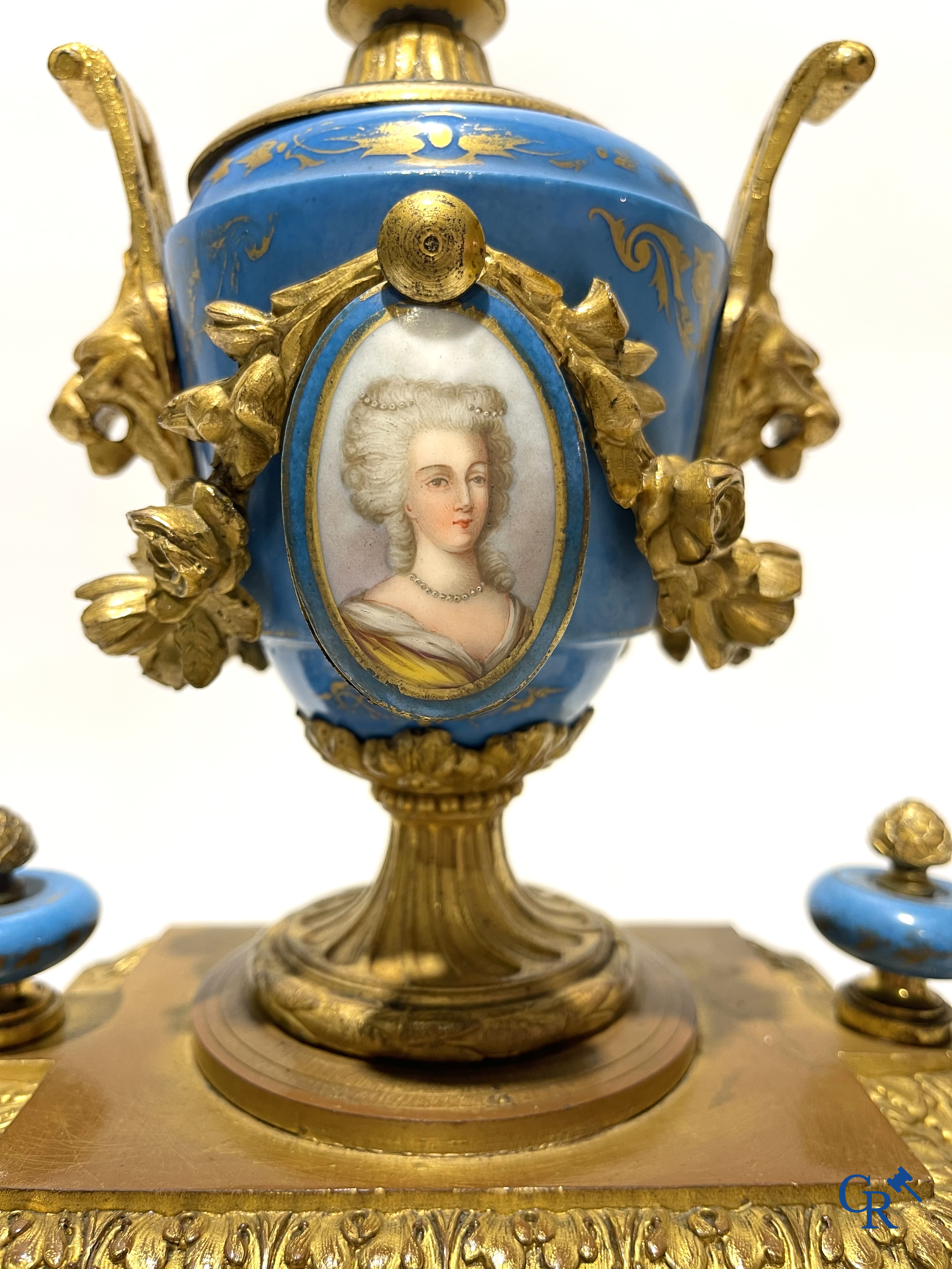 A 3-piece chimney clockset with Sèvres porcelain. LXVI style, circa 1920.