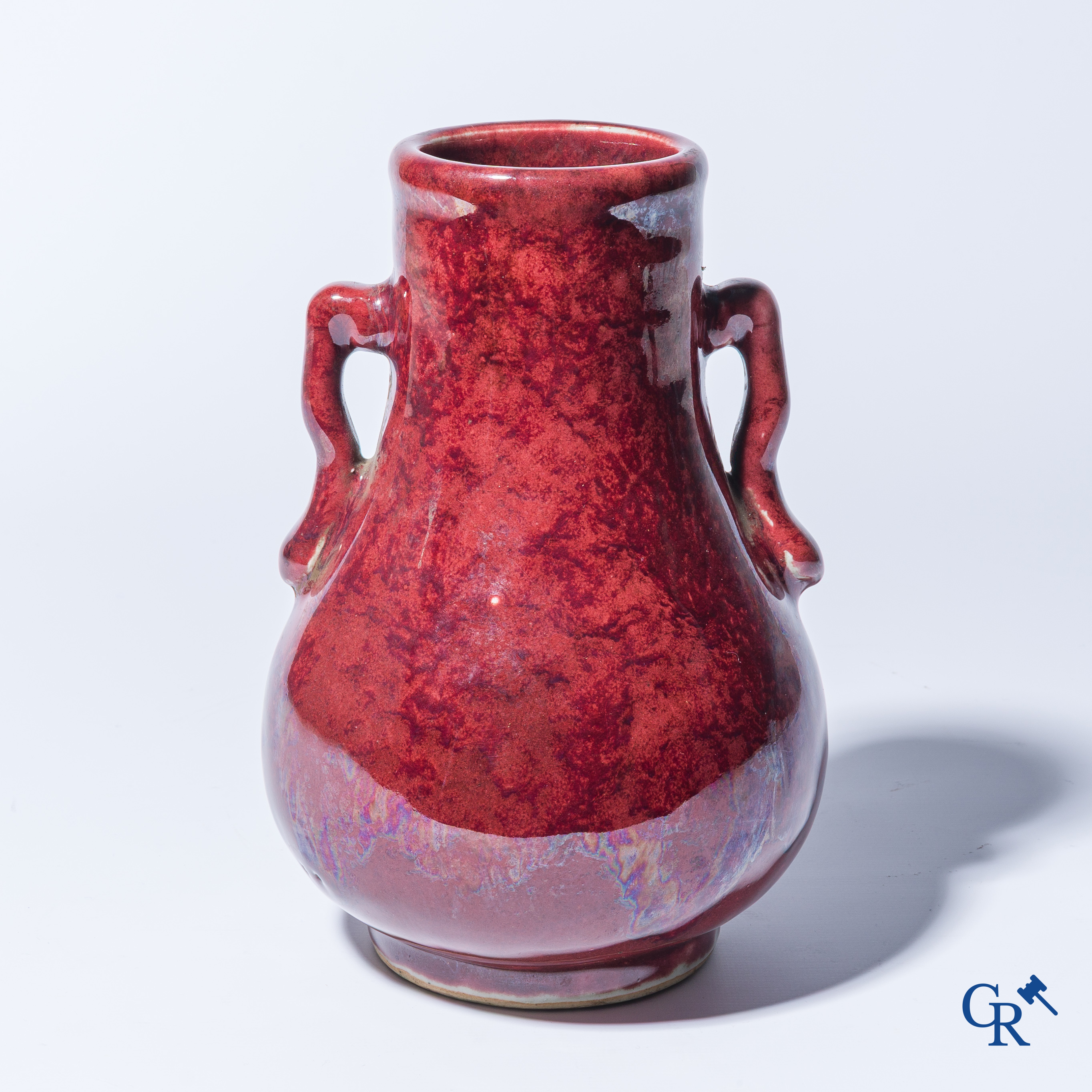 Asian Art. A Chinese porcelain Sang de boeuf vase. 19th century.