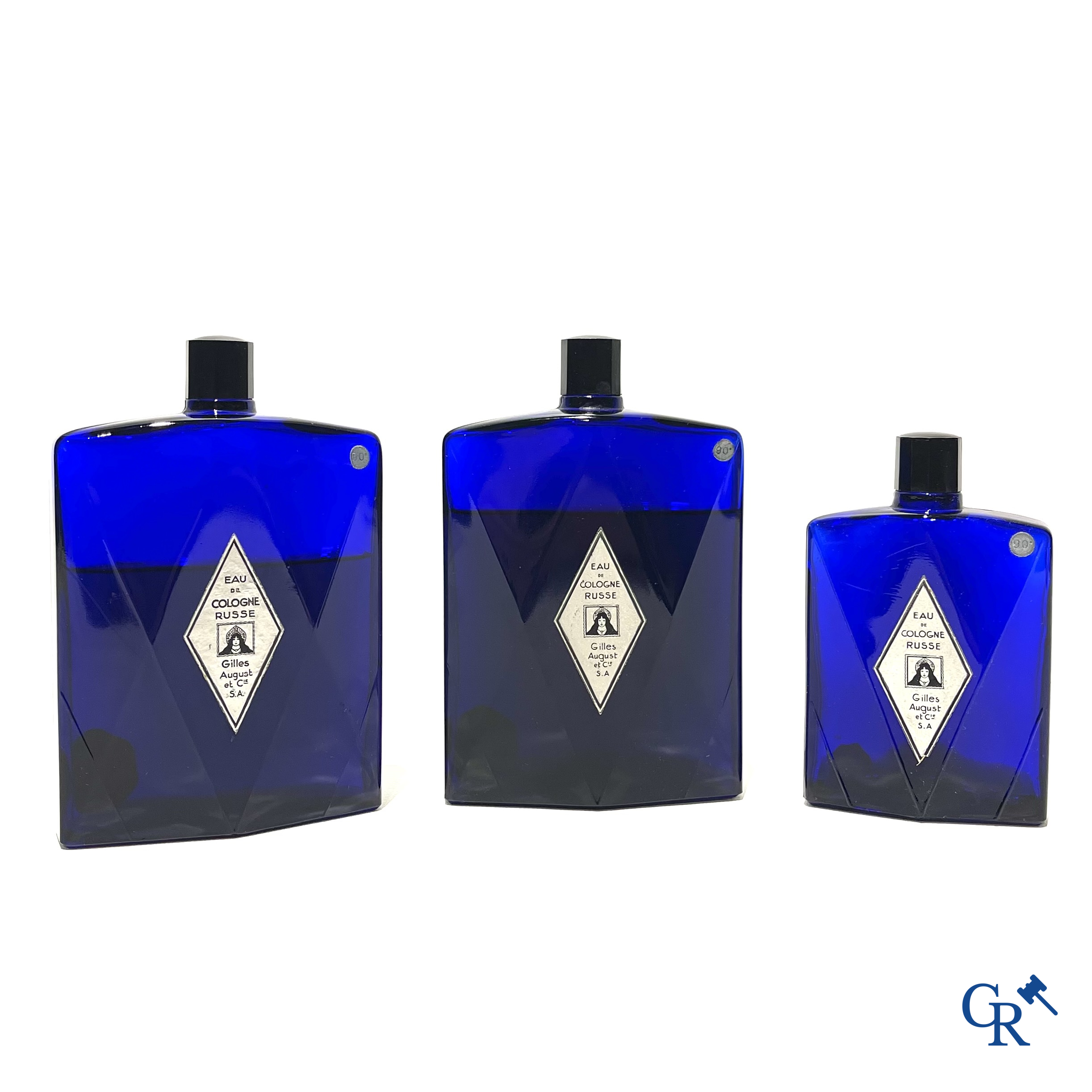 Art Deco. 3 saffier blauwe Eau de Cologne flessen voor Eau de Cologne Russe van Gilles August & Cie. Jaren '40.