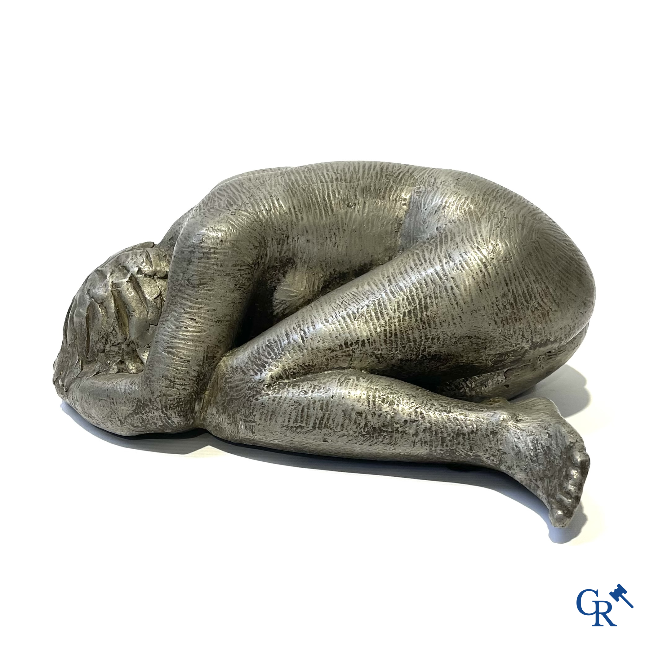 Irénée Duriez, Voorstelling van een liggend naakt in metaallegering. Gesigneerd en gedateerd I. Duriez '78.