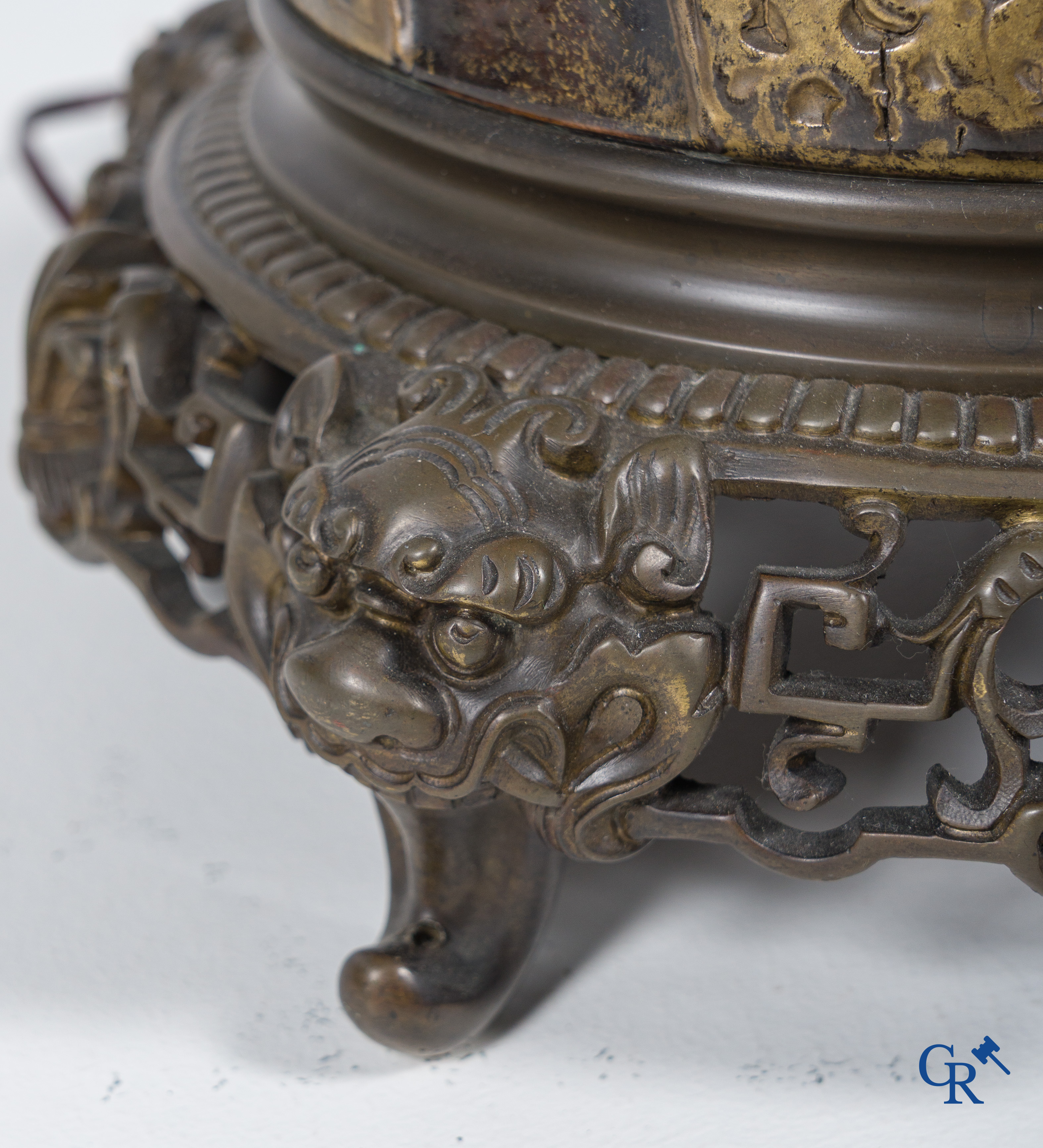 An imposing vase in French faience with bronze frames in Japonizing style mounted as a lamp. Circa 1890.