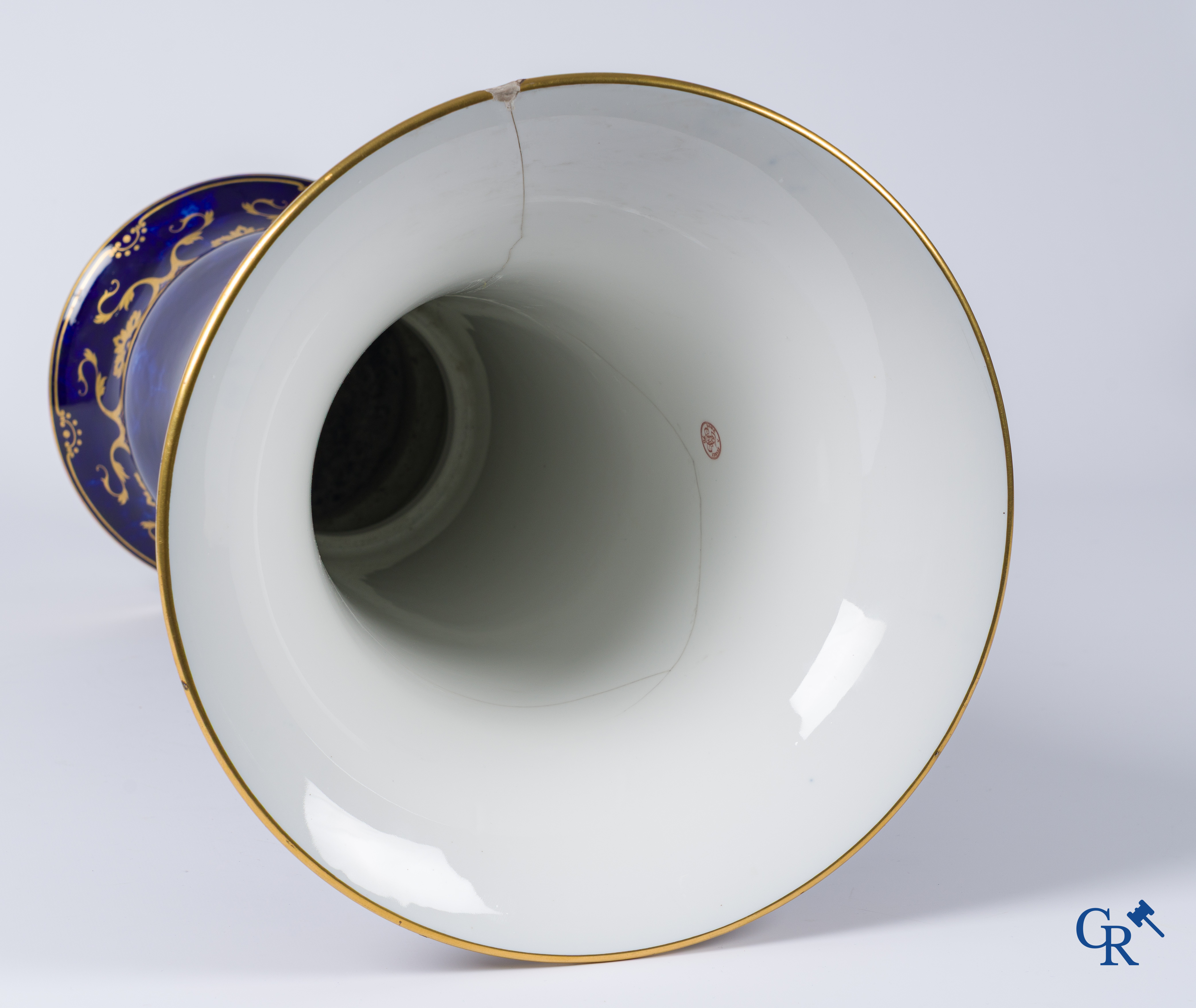 Manufacture Nationale de Sèvres. important vase with a gilded decor on a blue background colour.