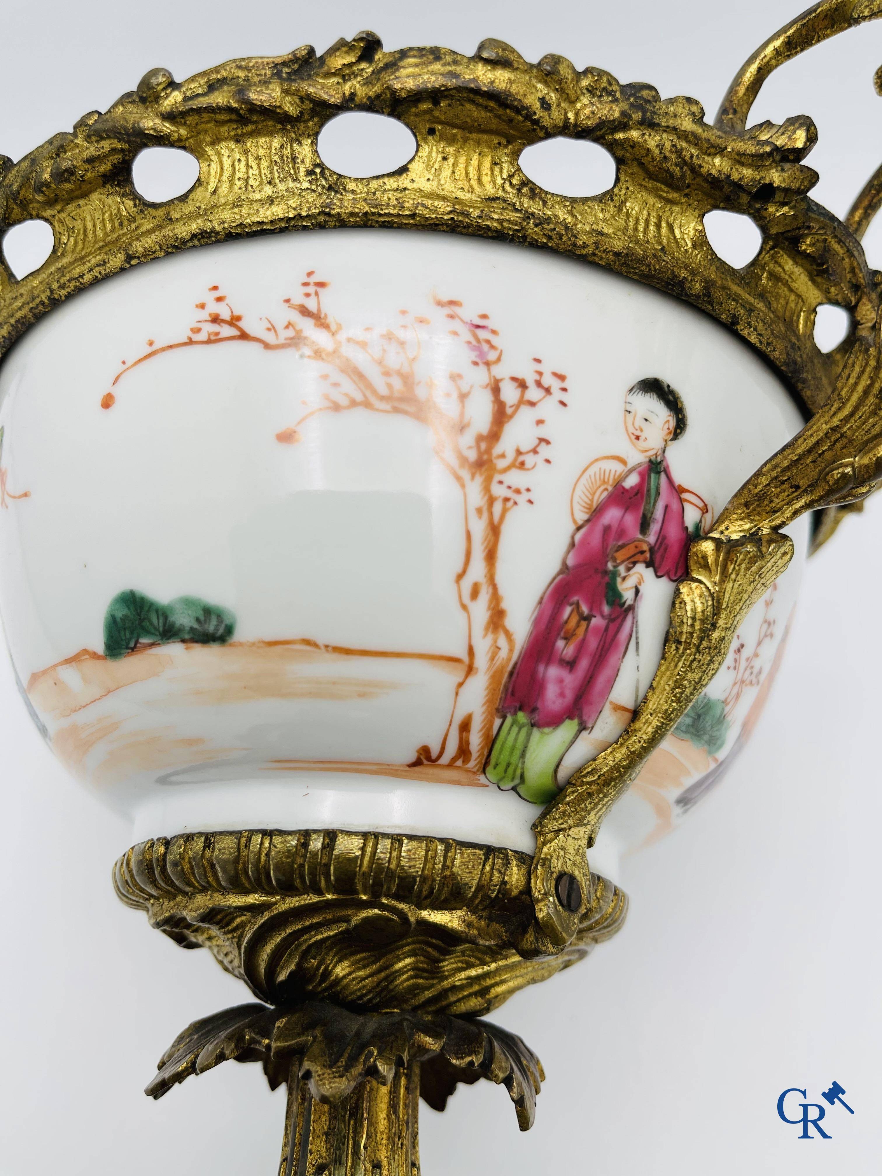 Chinese porcelain: An 18th century gilt-bronze mounted bowl in Chinese export porcelain.
