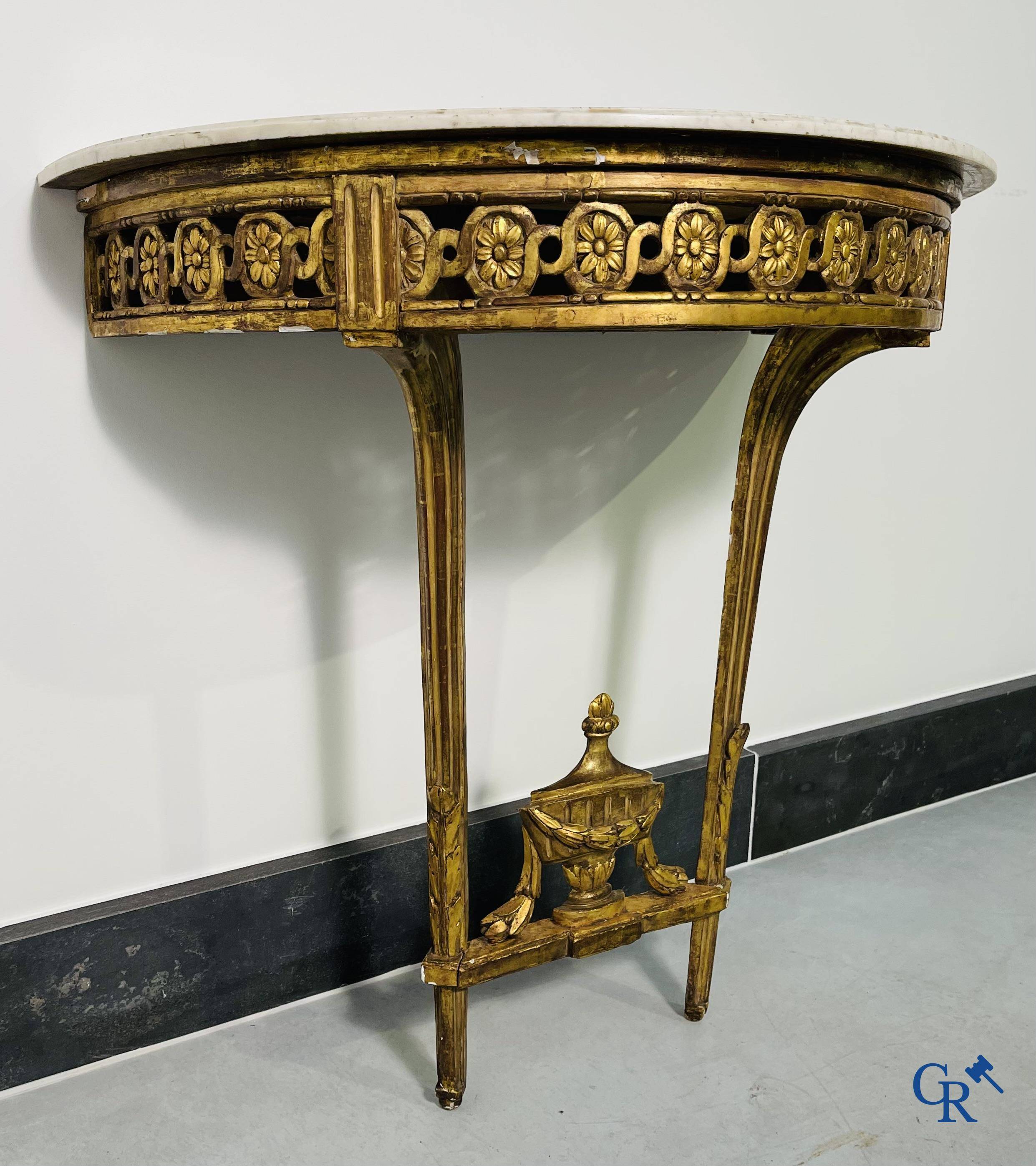 Furniture: Wood sculpted and gilded crescent shaped console. LXVI-period.