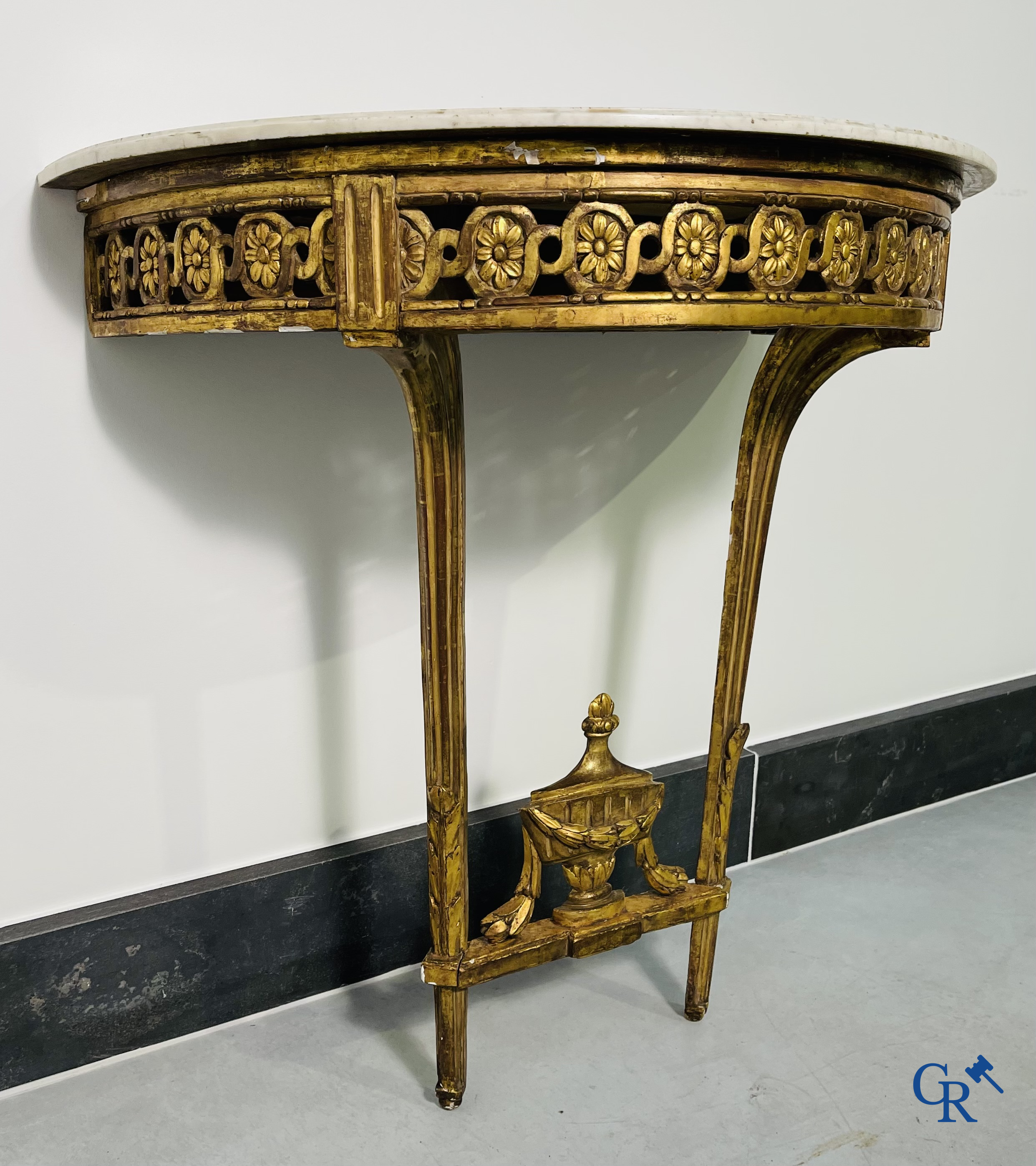 Furniture: Wood sculpted and gilded crescent shaped console. LXVI-period.
