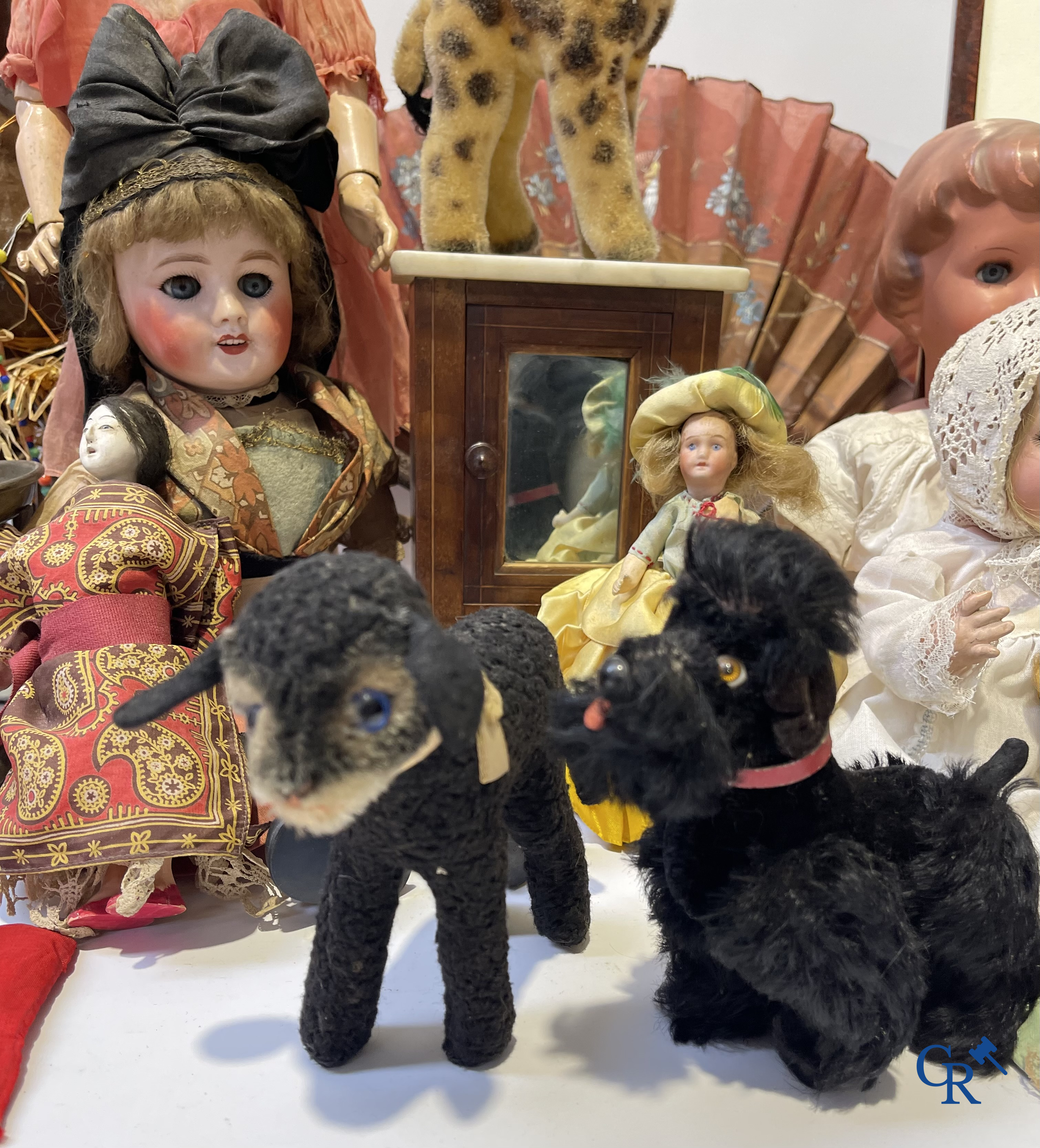 Old toys, a big lot with different antique dolls and collectibles.