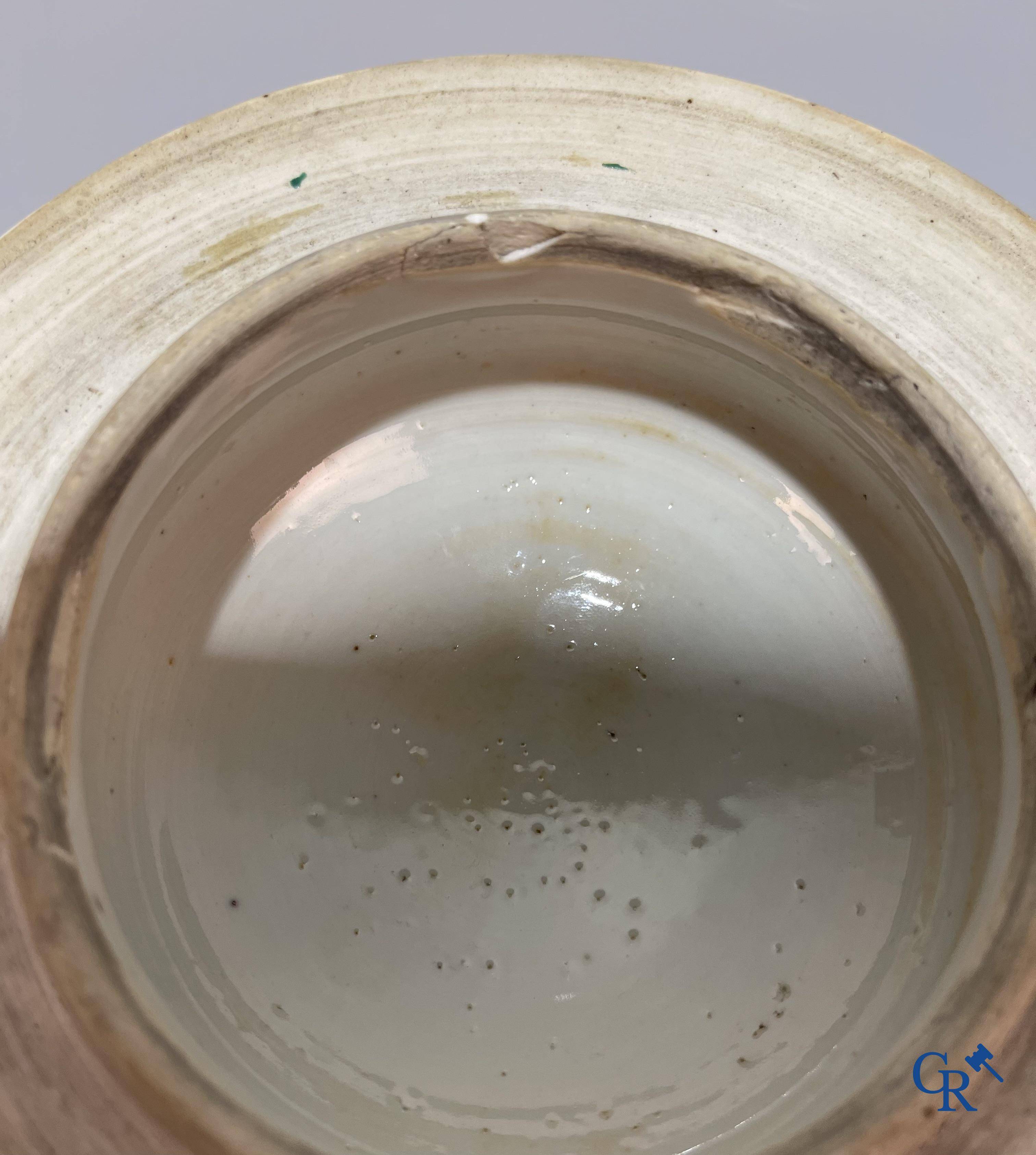 Asian Art, Chinese porcelain, a Chinese Wucai lidded vase with characters.