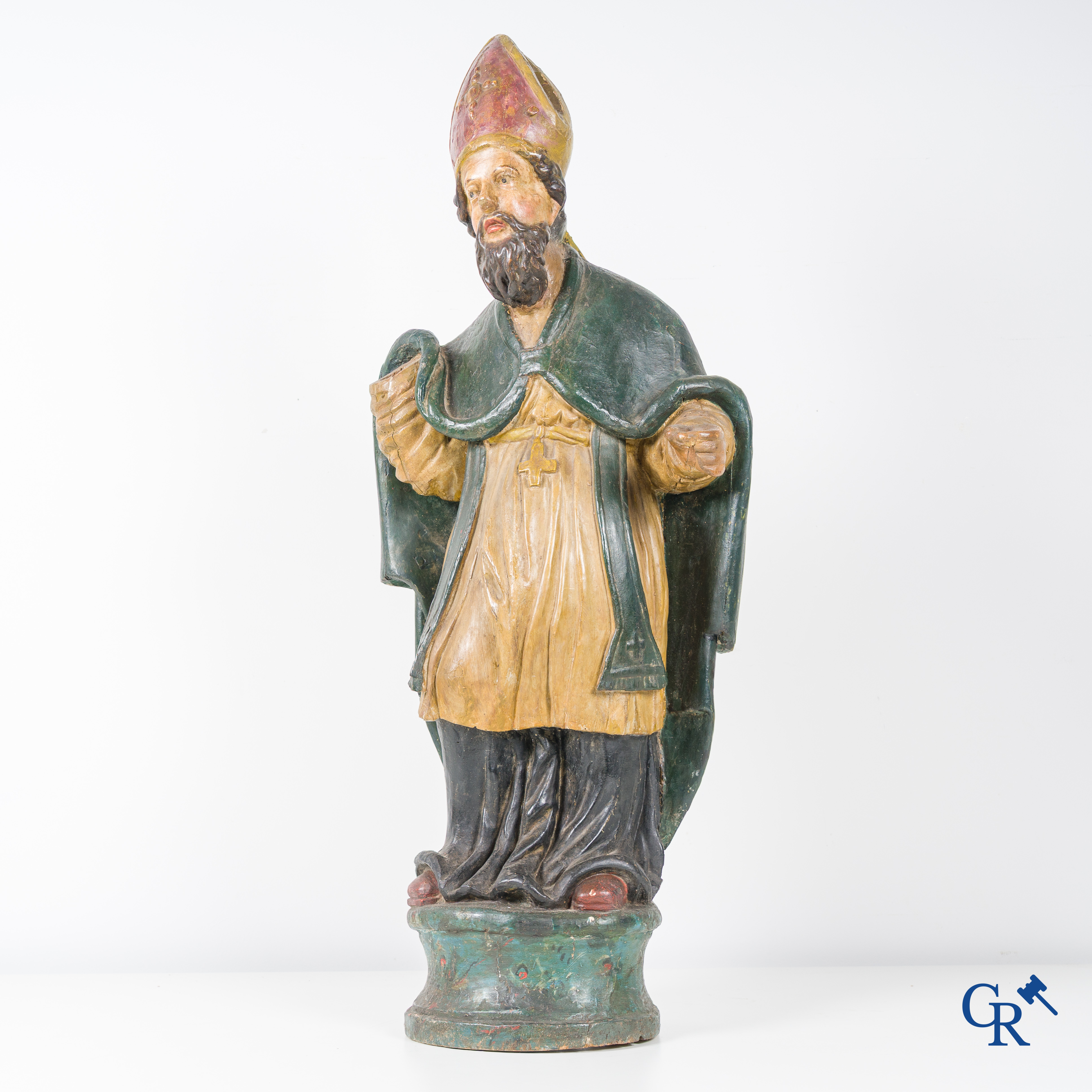 Religious objects, A wooden polychrome staute with a hollowed-out back. 18th century.