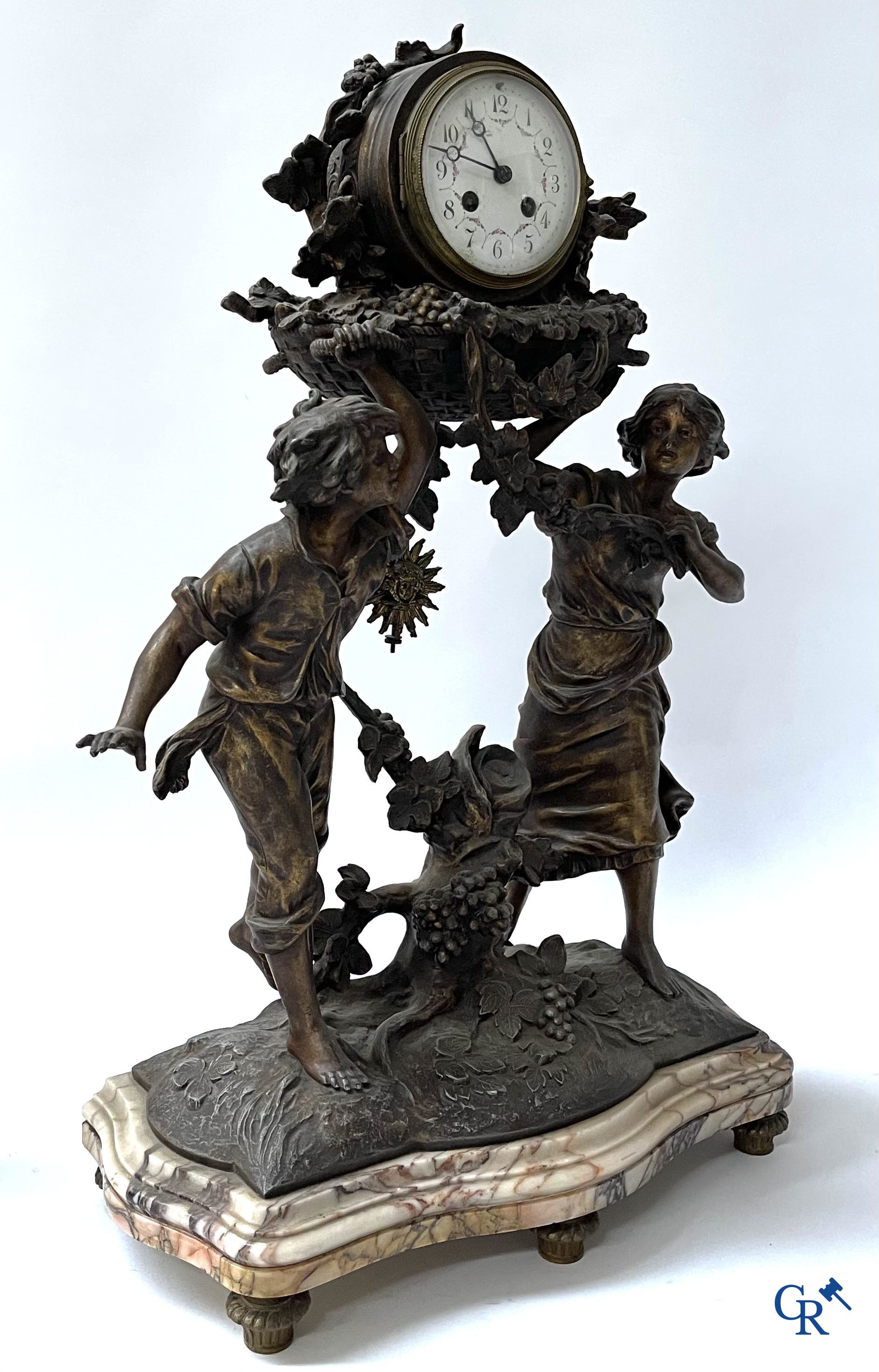 Louis & François Moreau (after). A large 3-piece fireplace set in spelter and marble. Circa 1910.