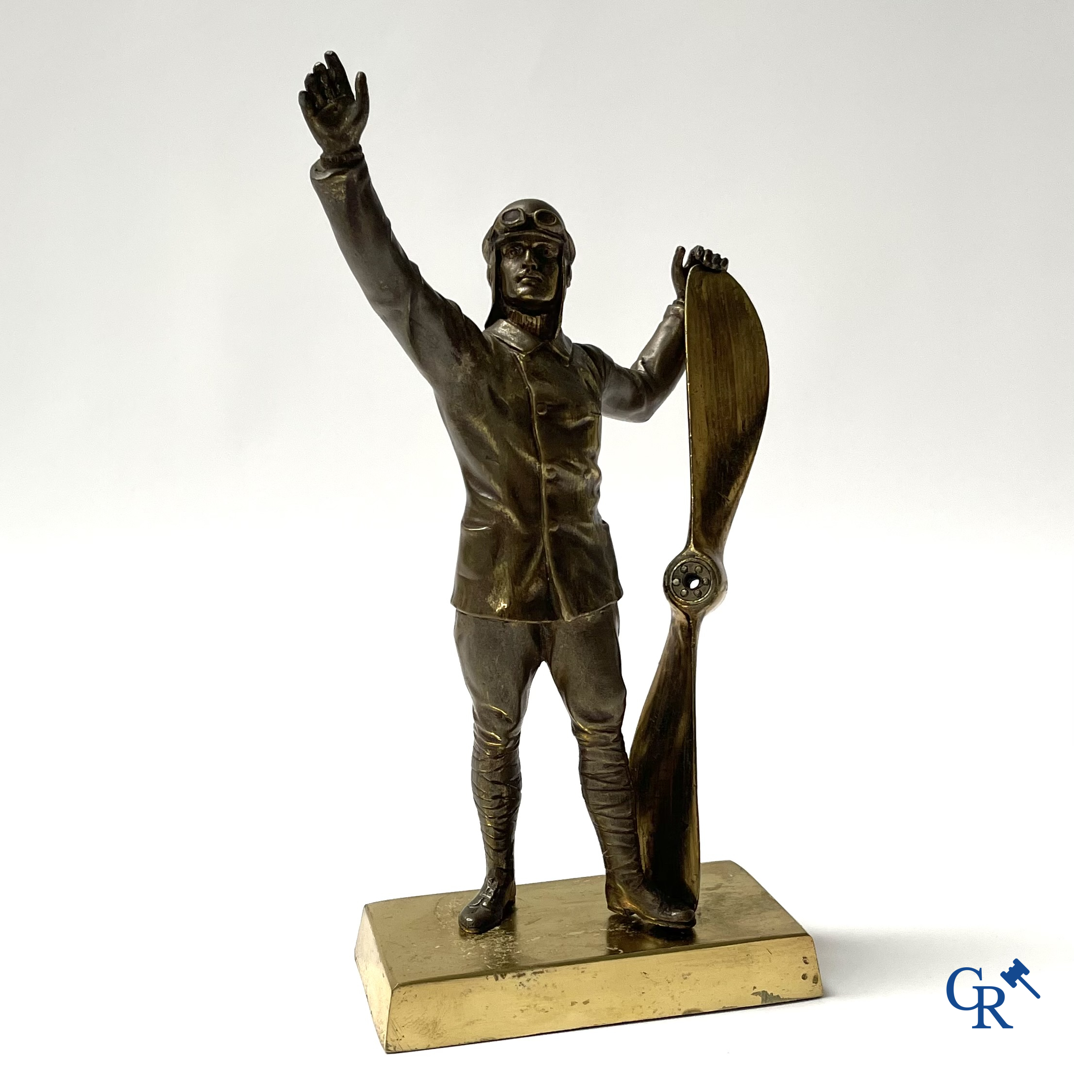 Aeronautics, a bronze representation of an aircraft pilot with propeller. Around 1930.