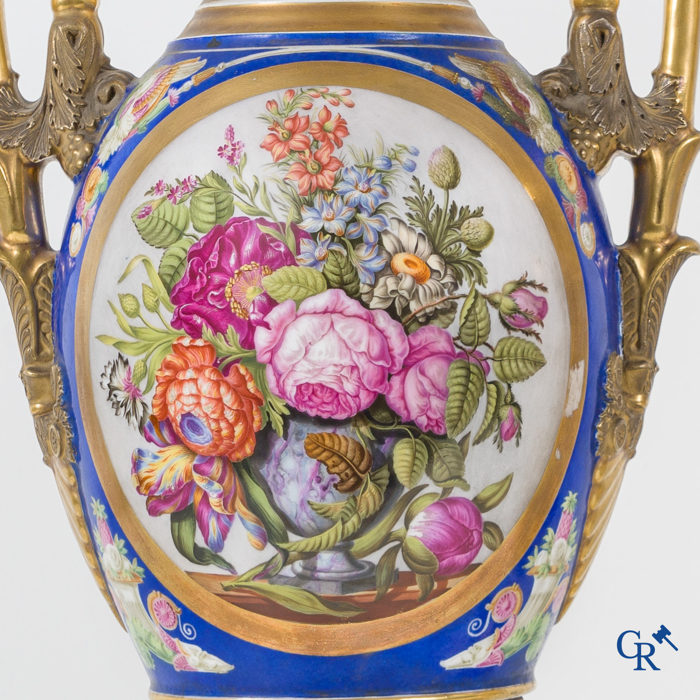 Empire, a pair of imposing multicolored decorated and gilded vases. Early 19th century.