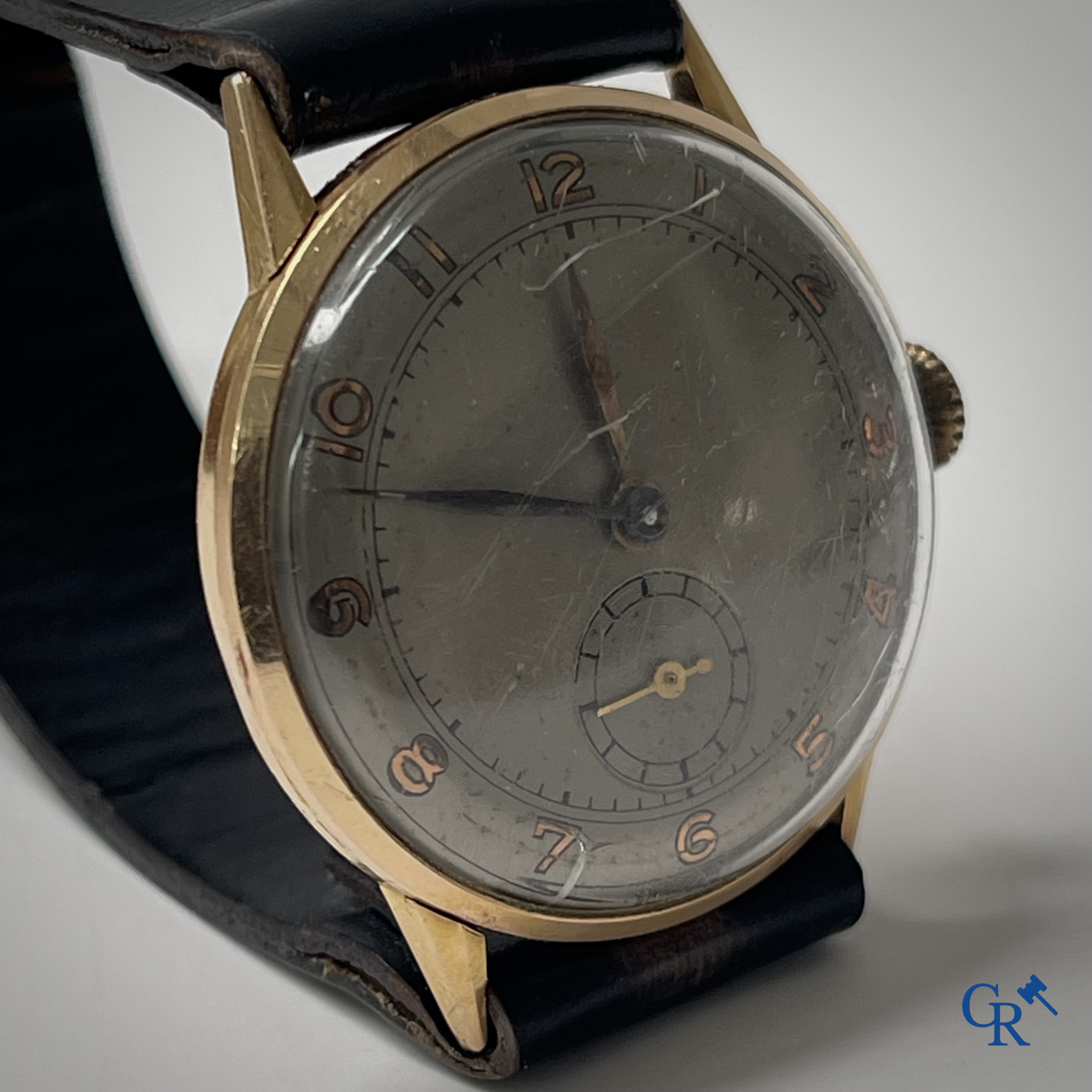 Watches. Swiss work. A men's wristwatch with gold 750°/00 watch case.