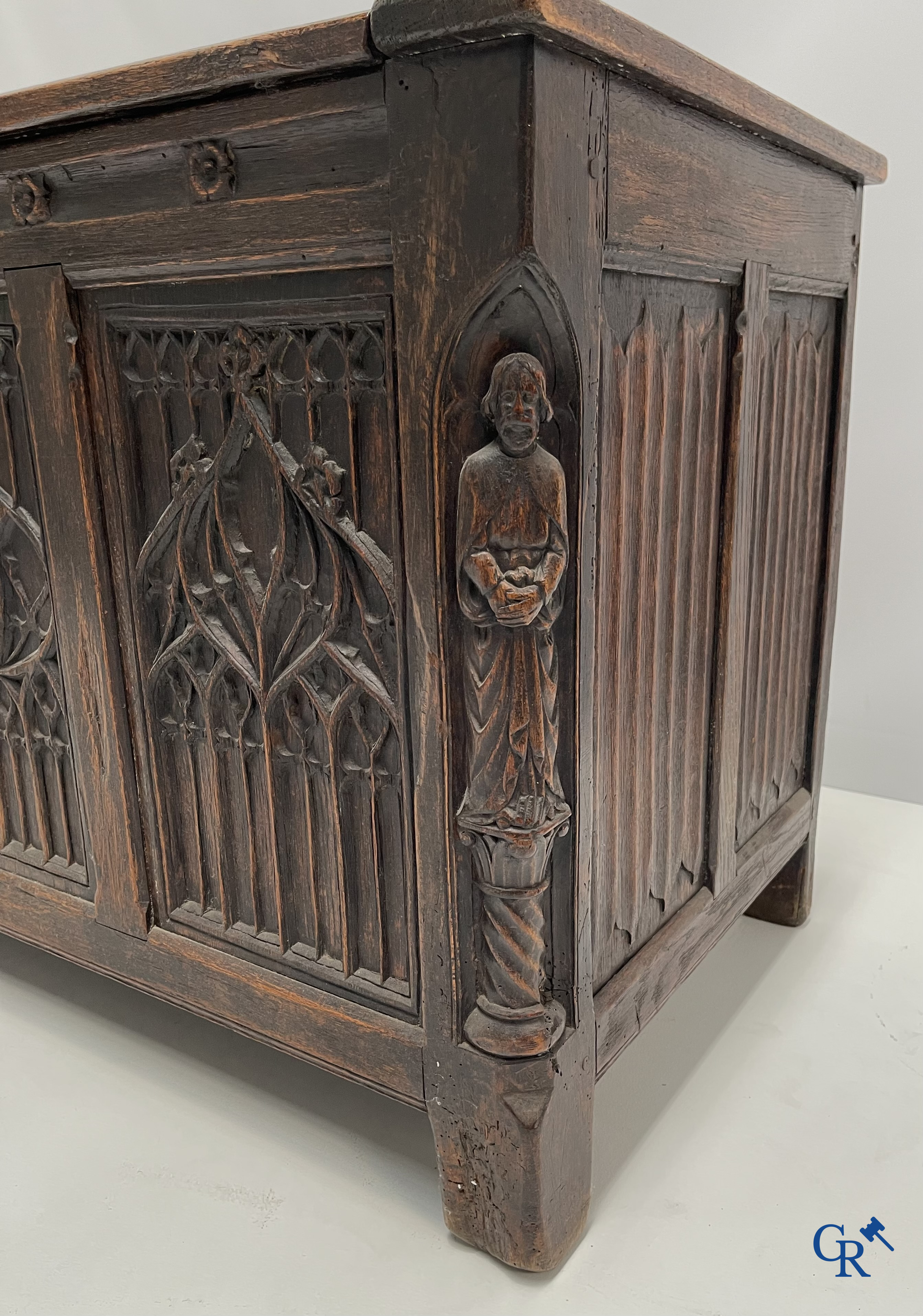 Furniture. Oak trunk with carved panels in Gothic style. Early 19th century.