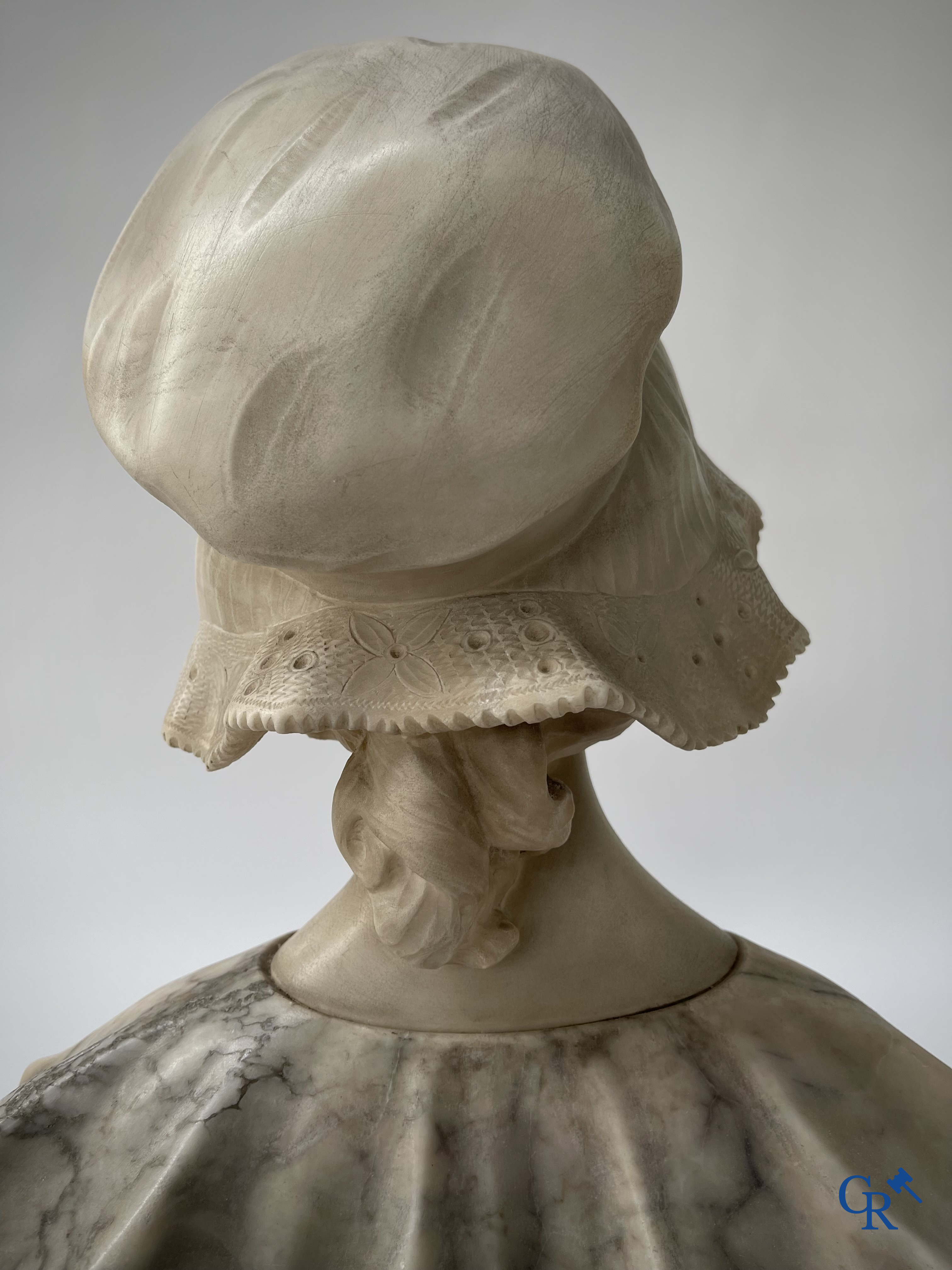 G. Van Vaerenbergh. A large bust in marble signed Van Vaerenbergh and a bust in marble and bronze. Around 1920.