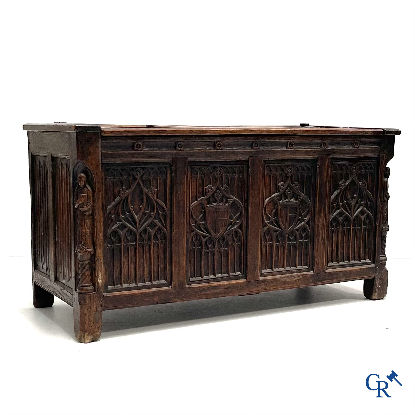 Furniture. Oak trunk with carved panels in Gothic style. Early 19th century.