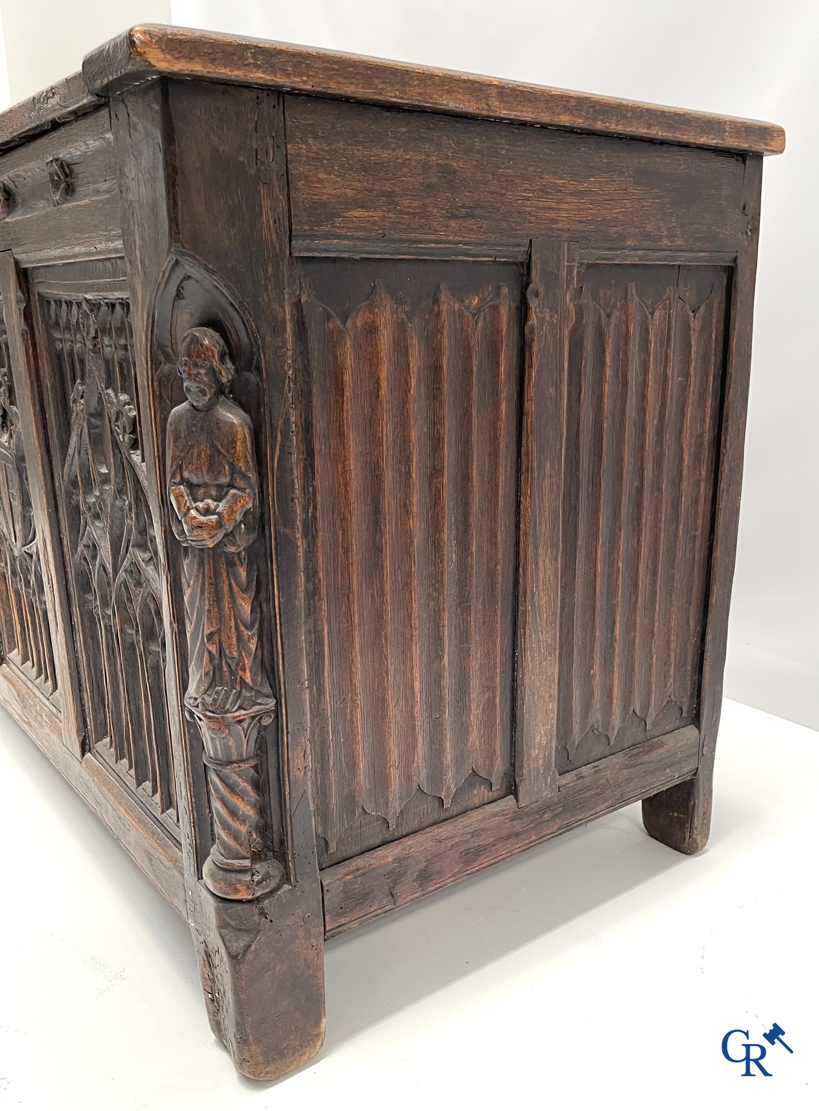 Furniture. Oak trunk with carved panels in Gothic style. Early 19th century.