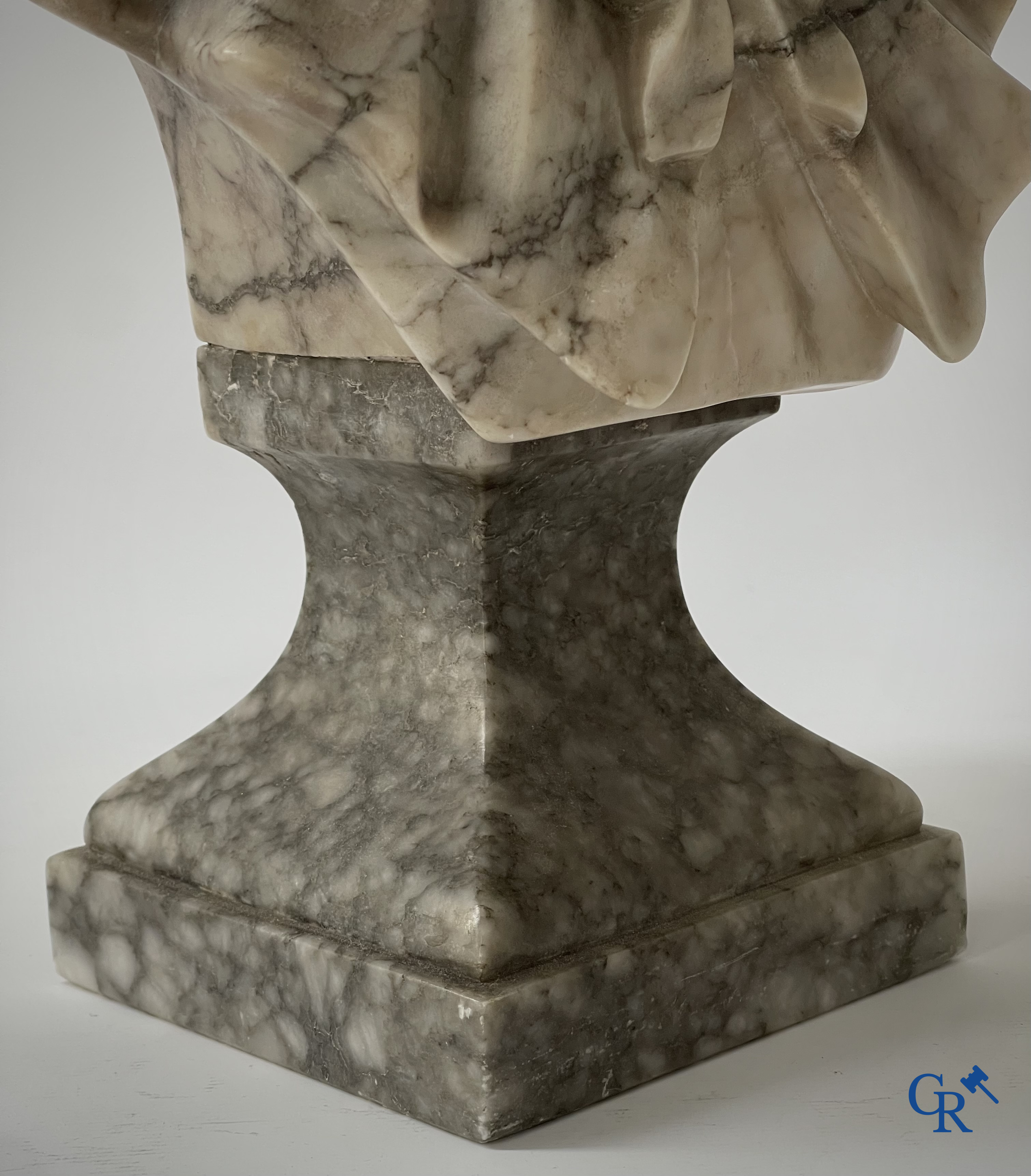 G. Van Vaerenbergh. A large bust in marble signed Van Vaerenbergh and a bust in marble and bronze. Around 1920.