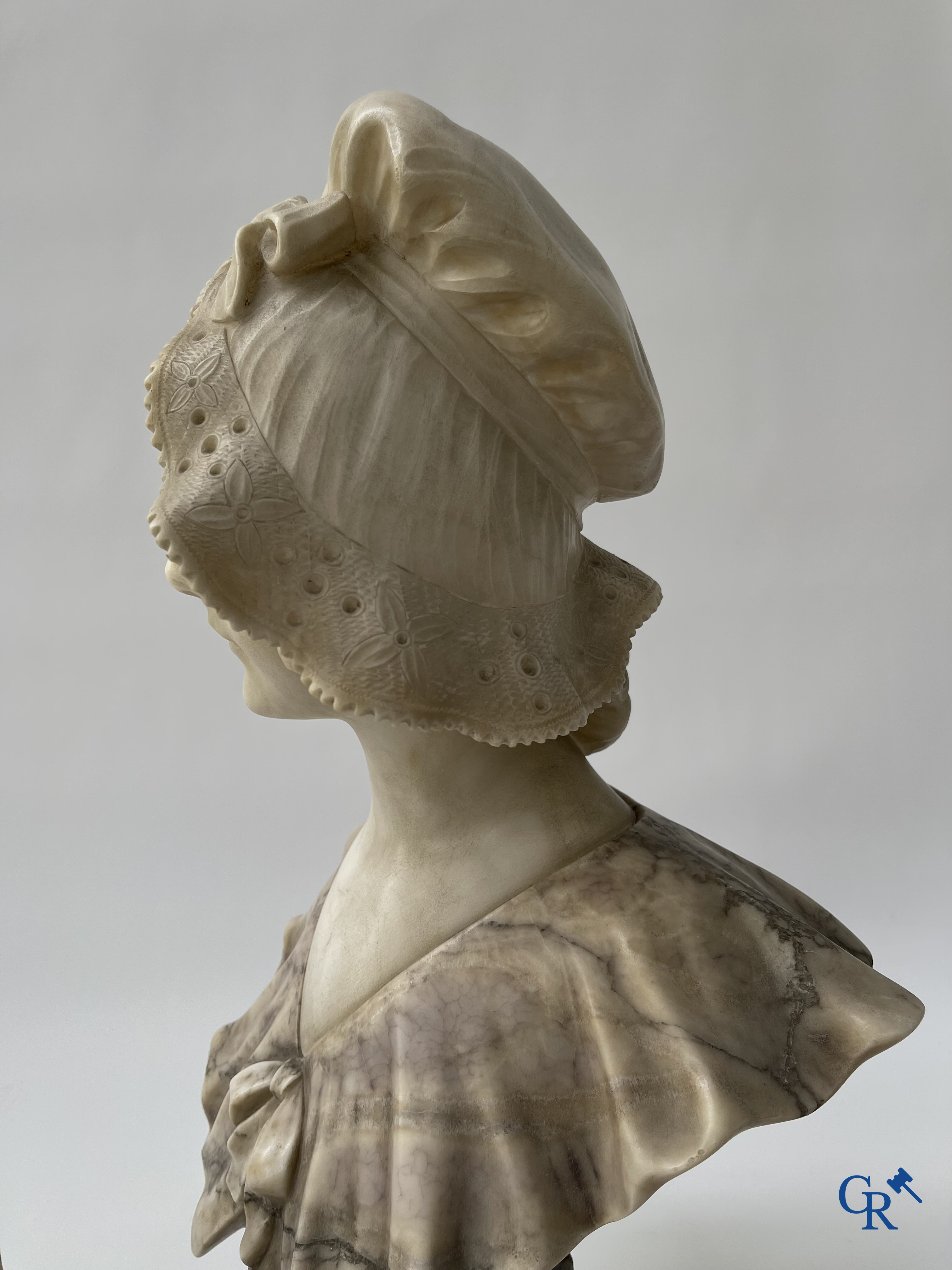 G. Van Vaerenbergh. A large bust in marble signed Van Vaerenbergh and a bust in marble and bronze. Around 1920.