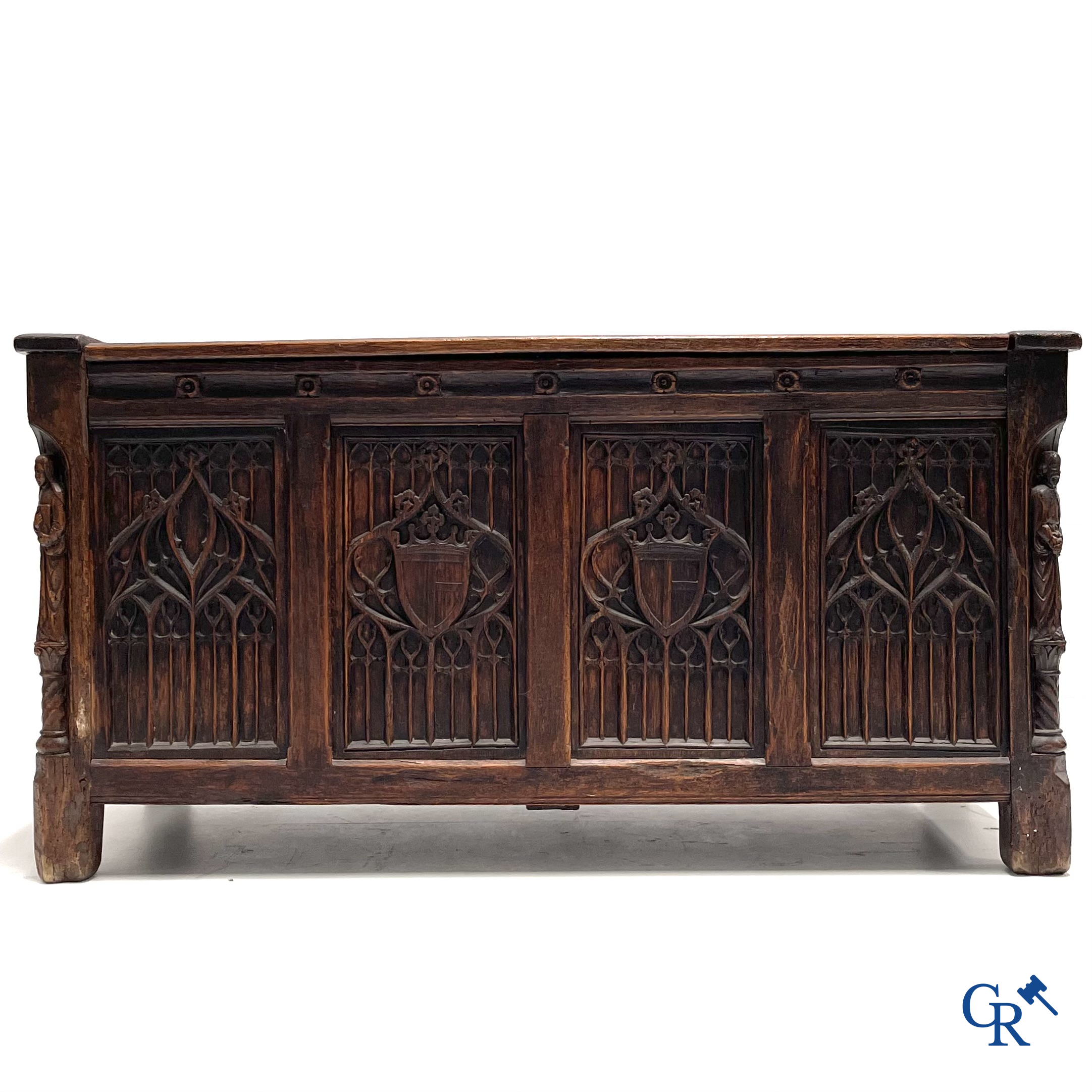 Furniture. Oak trunk with carved panels in Gothic style. Early 19th century.