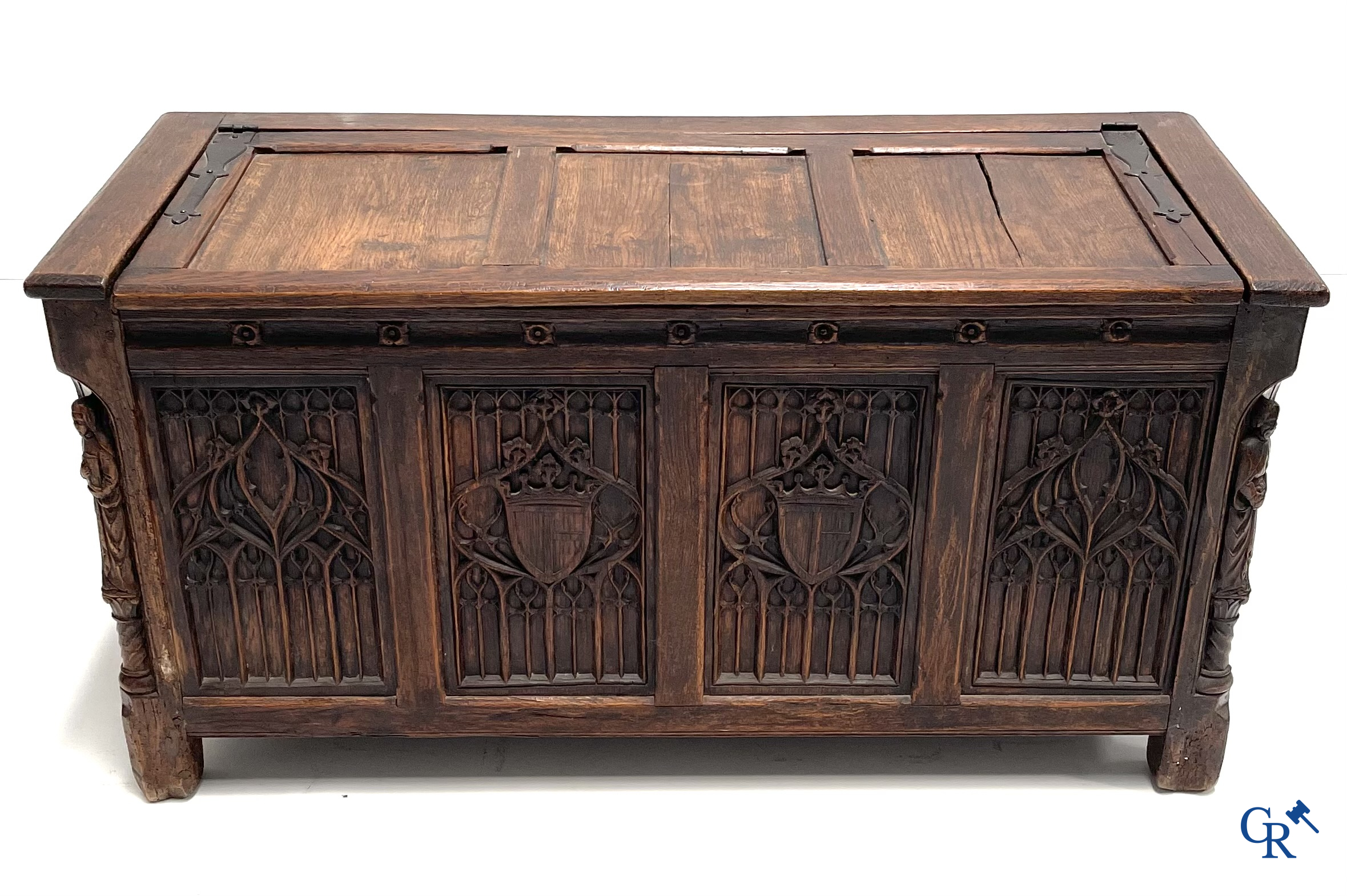 Furniture. Oak trunk with carved panels in Gothic style. Early 19th century.