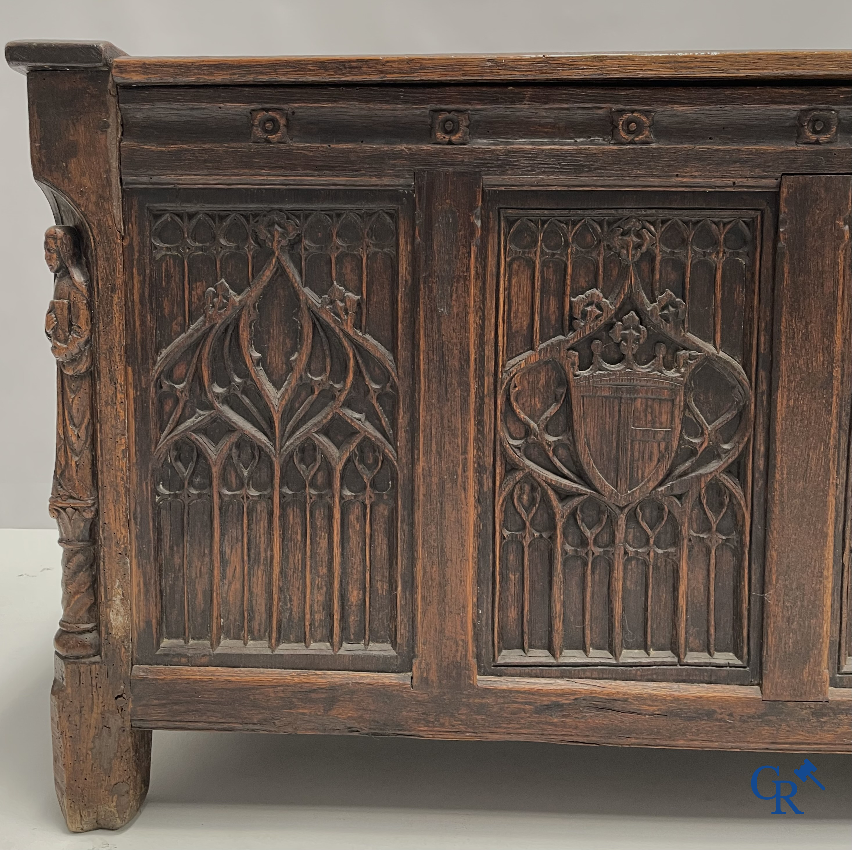 Furniture. Oak trunk with carved panels in Gothic style. Early 19th century.