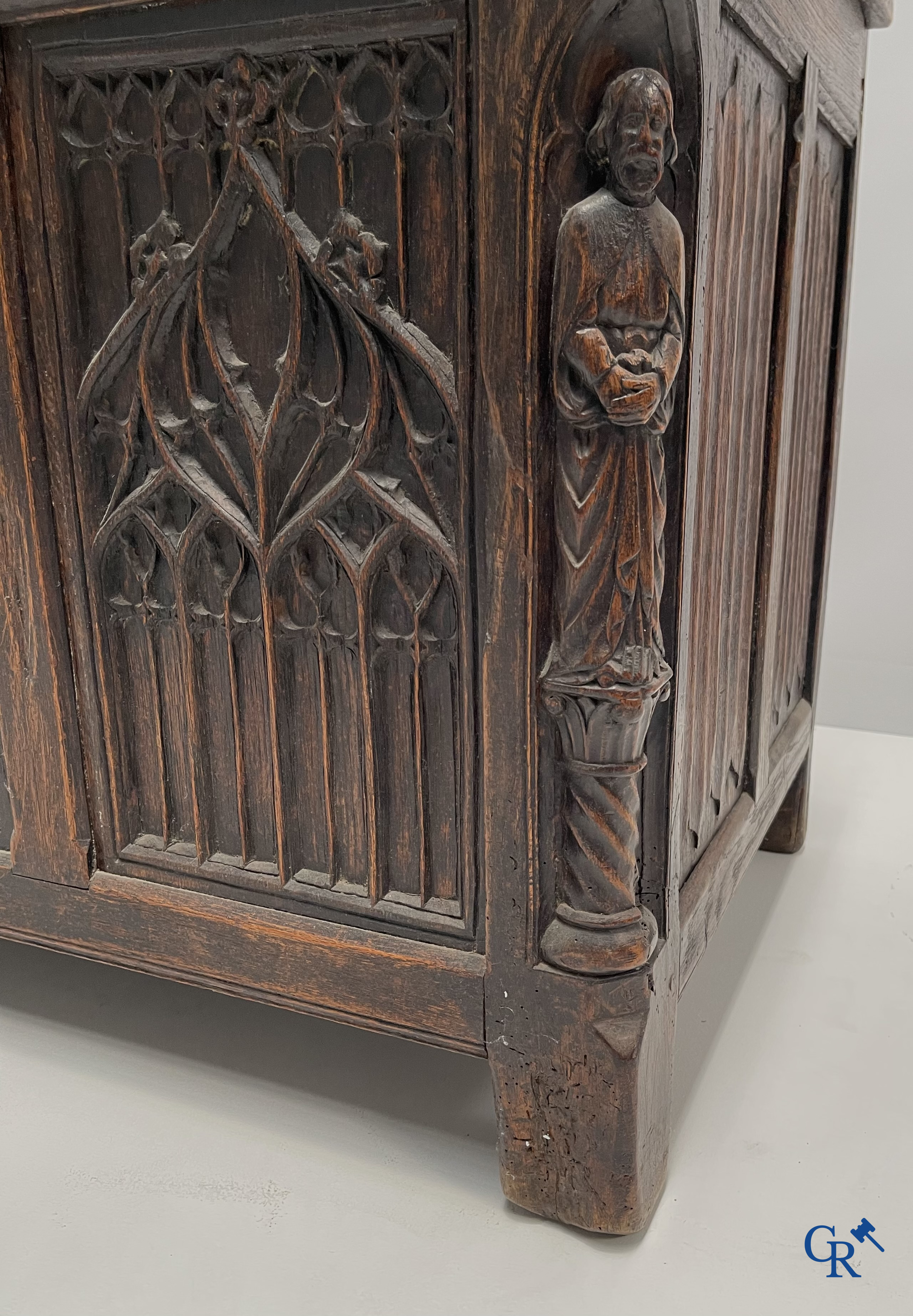 Furniture. Oak trunk with carved panels in Gothic style. Early 19th century.